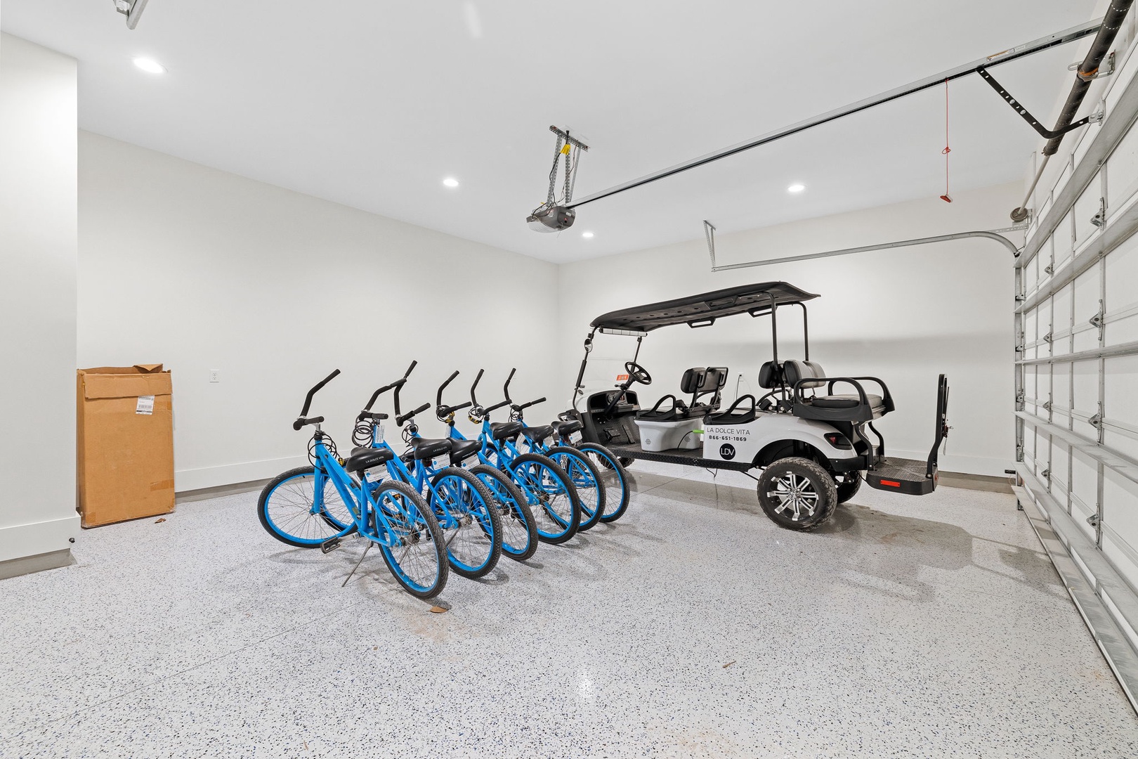 Your private garage comes equipped with bicycles and a golf cart, making local adventures effortless and fun.