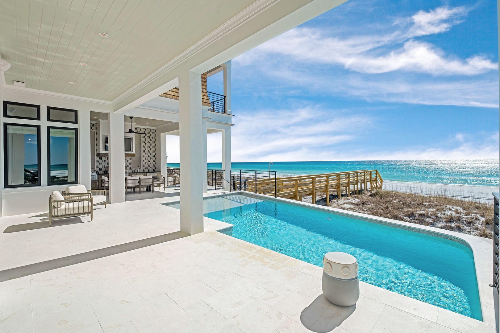 Your private pool deck offers direct beach access and stunning ocean views, perfect for morning swims and sunset relaxation.