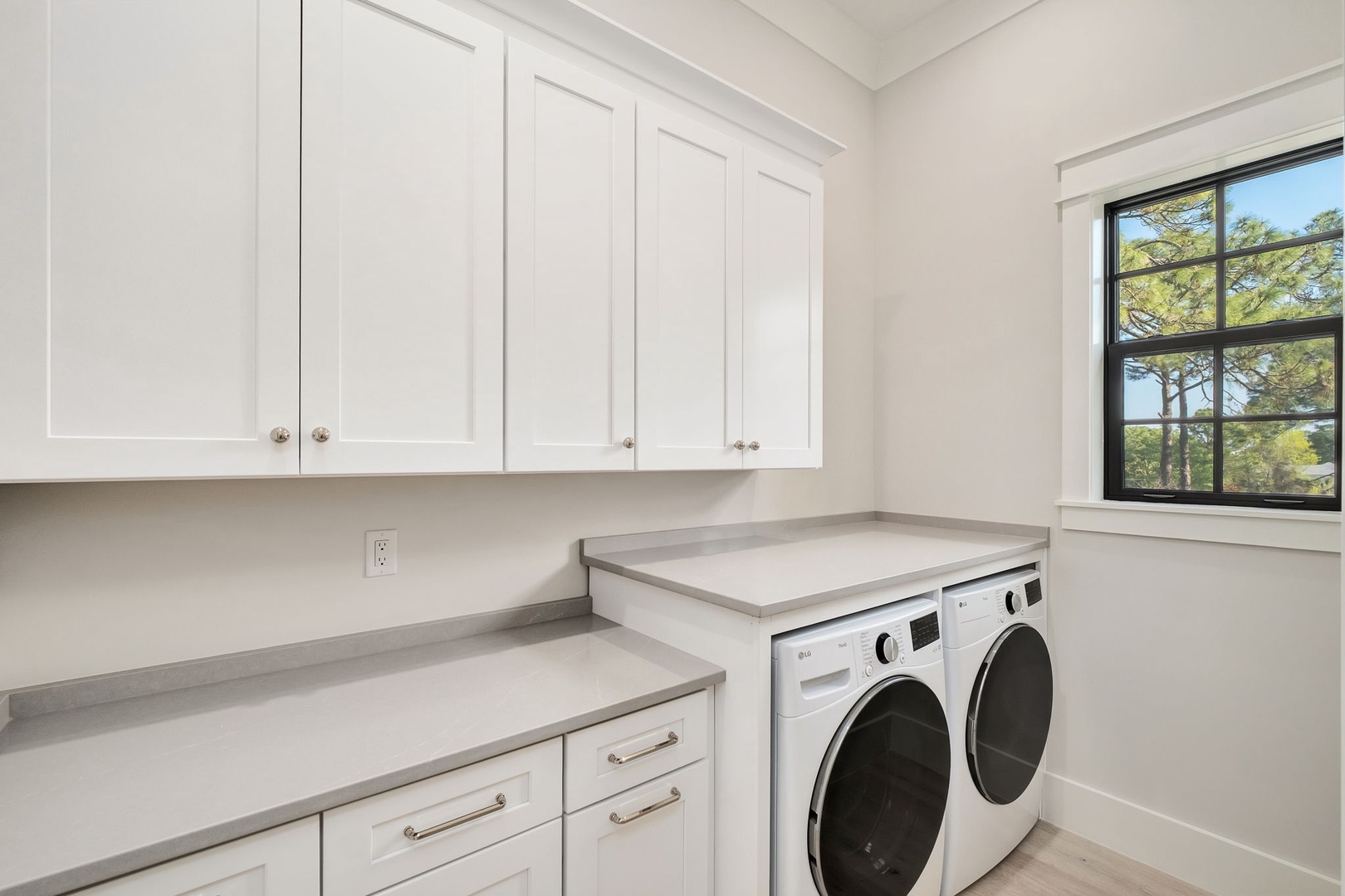 Your dedicated laundry room features modern machines and ample cabinet storage, making it easy to keep your belongings fresh during your stay.