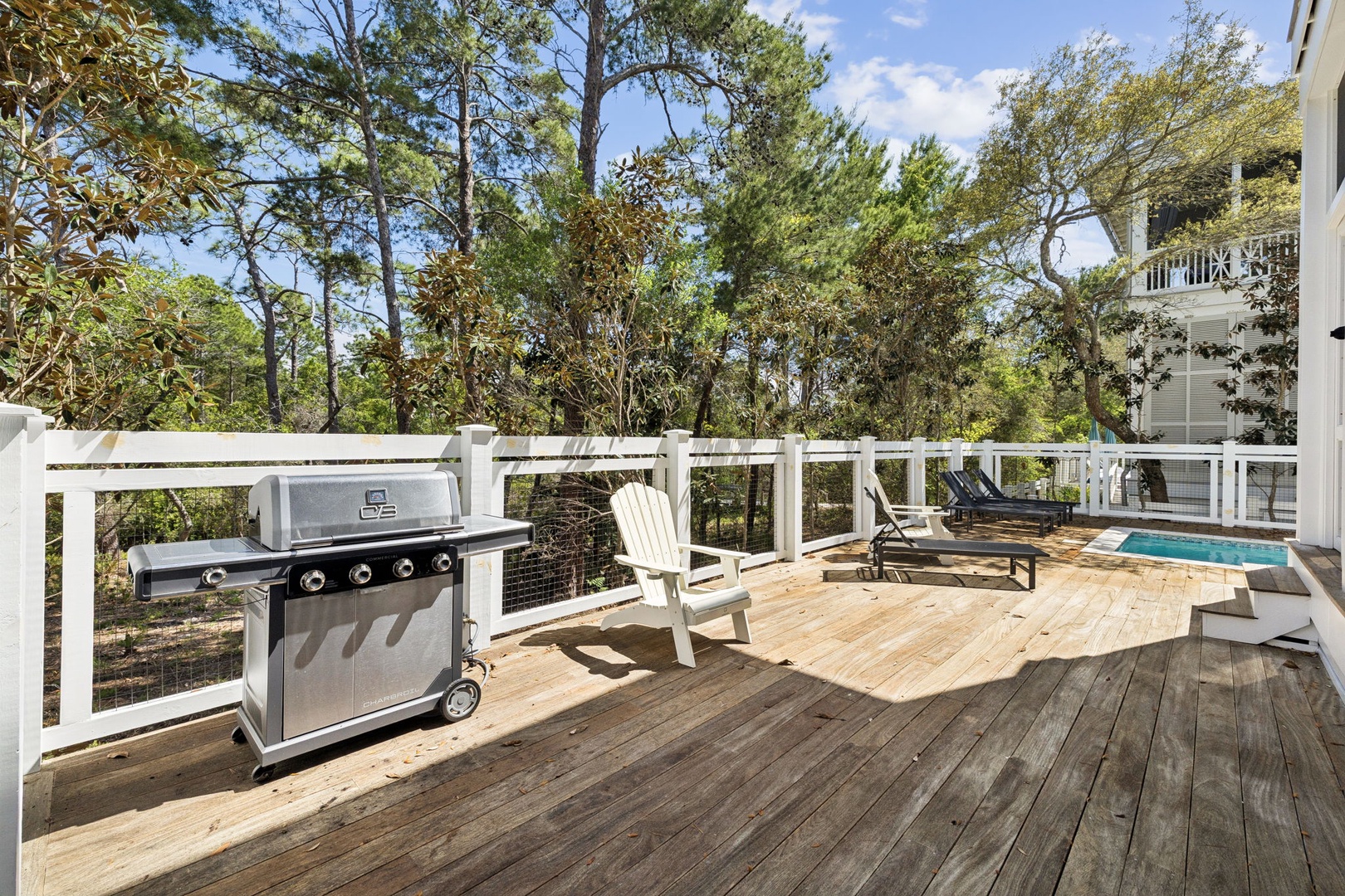 Your private deck offers the perfect blend of relaxation and outdoor dining, with a premium grill ready for your culinary adventures.