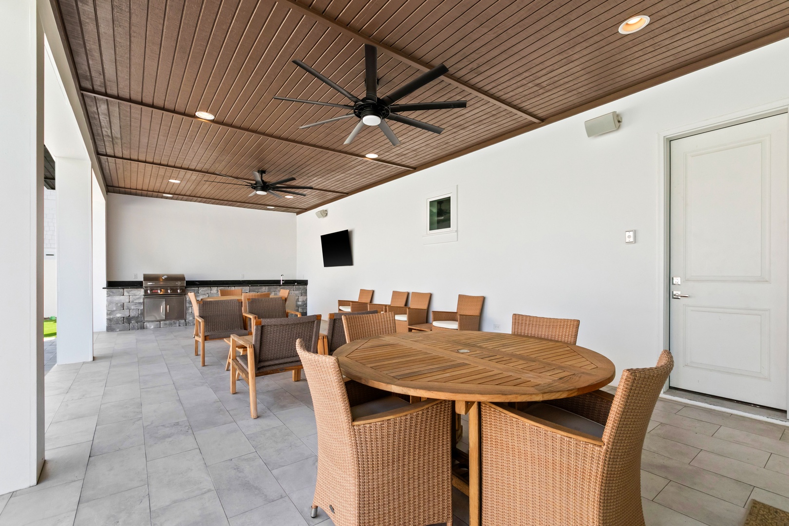 Gather around the outdoor dining area for meals under the covered patio, with a grill ready for your use and plenty of seating for everyone.