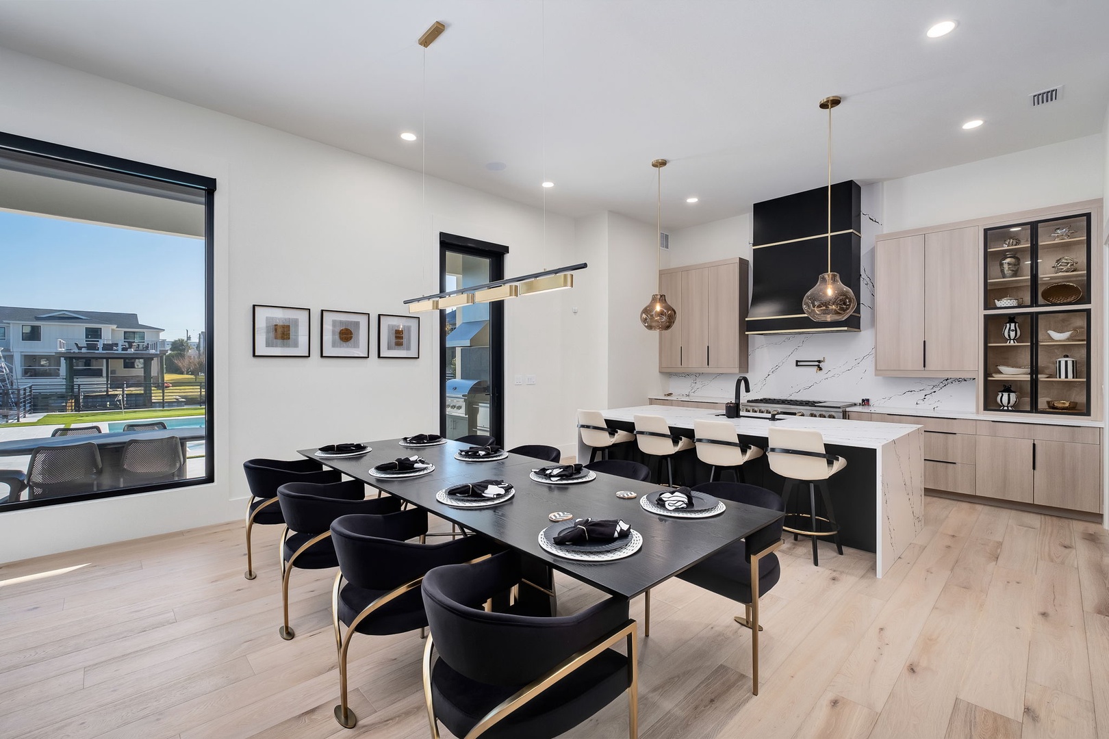 Your spacious dining and kitchen area features sleek modern design with elegant pendant lighting and everything you need for memorable meals.