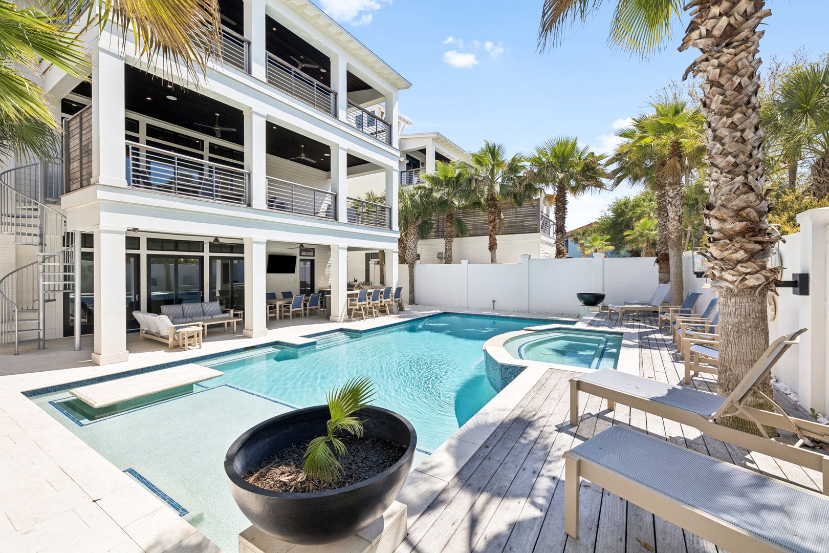Step into your private oasis where sparkling waters and swaying palms create the perfect backdrop for unforgettable moments.