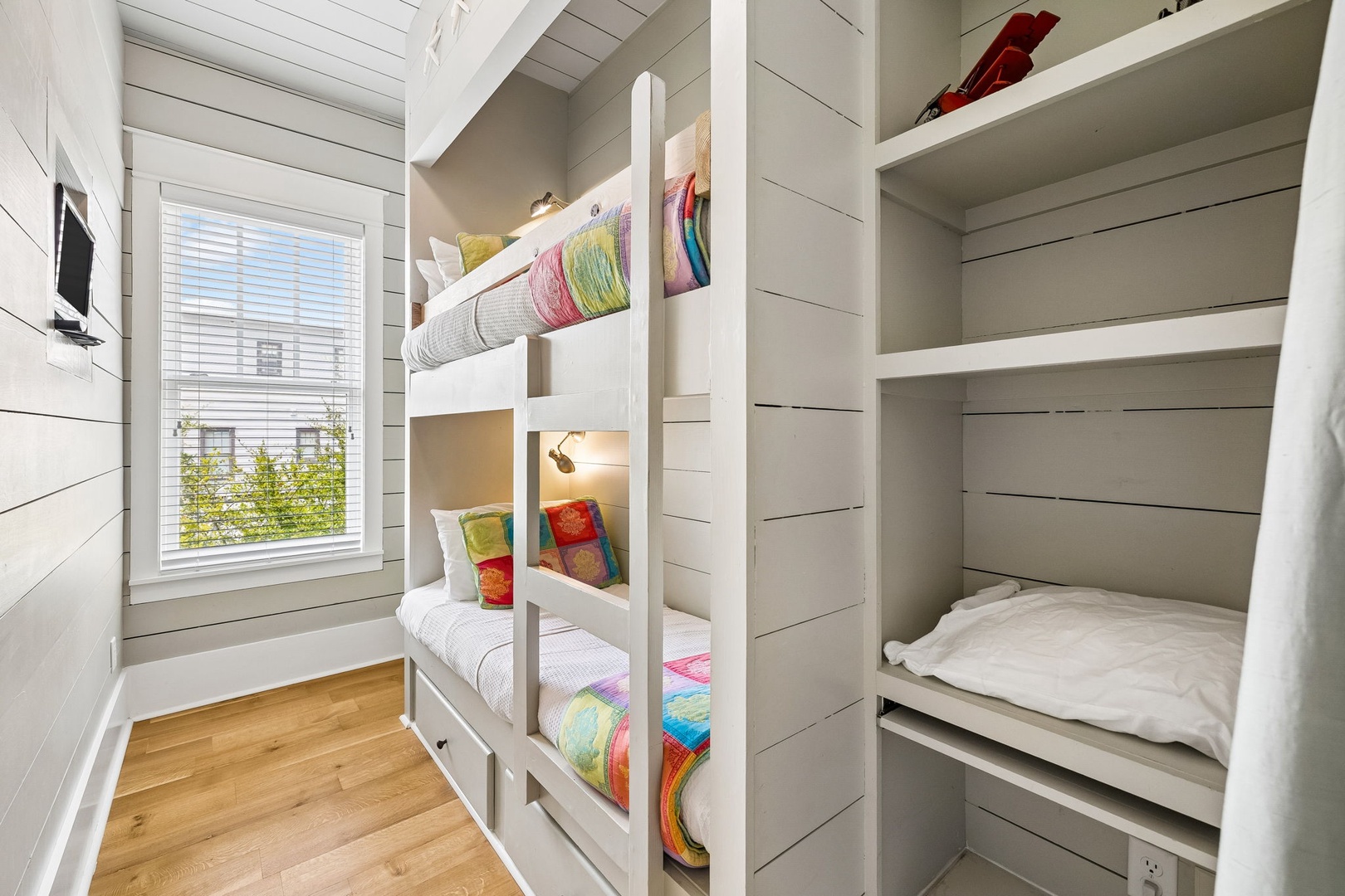 Your cozy bunk room makes the most of every inch, with built-in beds and storage nooks perfect for tucking little ones (or friends) in for the night.