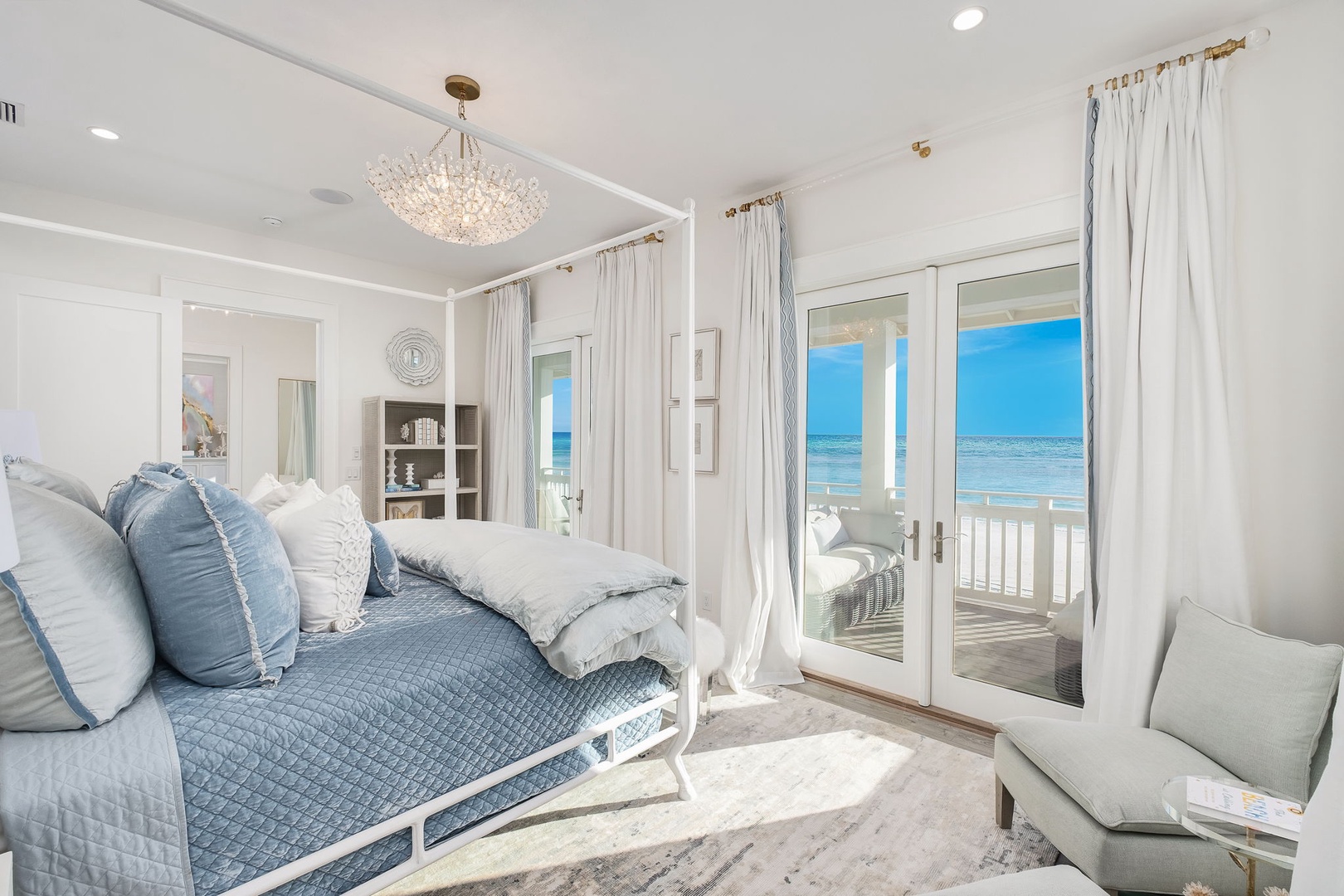 Wake up to stunning ocean views from your beautifully appointed bedroom, where soft linens and coastal breezes promise restful mornings and peaceful evenings by the sea.