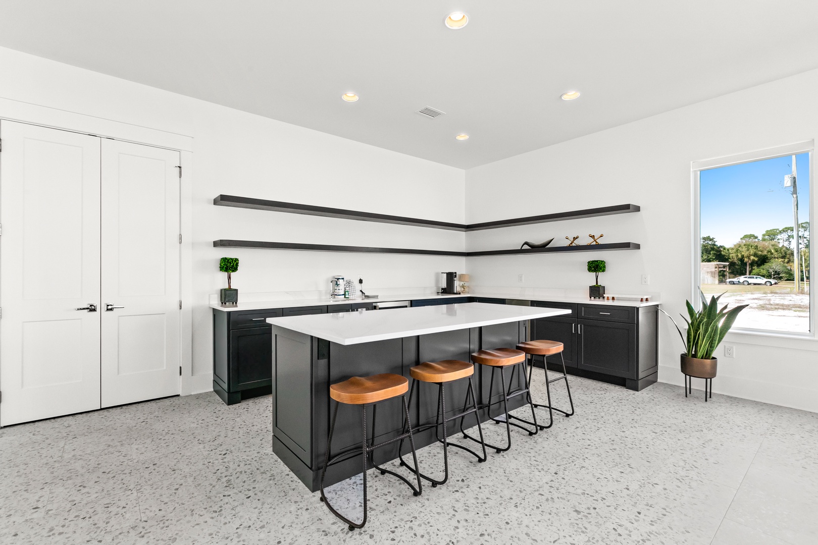 Gather around your spacious modern kitchen with a gleaming center island and ample seating for morning coffee or casual meals together.