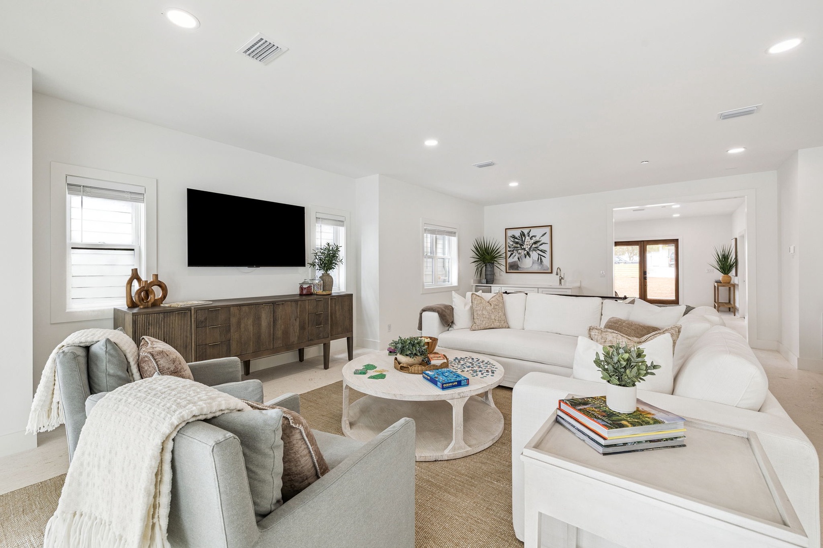 Sink into plush seating and unwind in your bright, airy living room with modern amenities and thoughtful touches throughout.