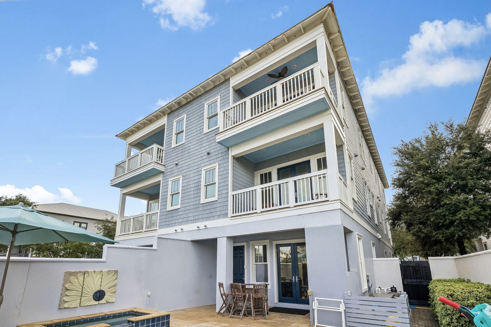 The property stands ready to welcome you with its coastal-inspired architecture, multiple private balconies, and a refreshing pool surrounded by a private courtyard—your personal retreat awaits.