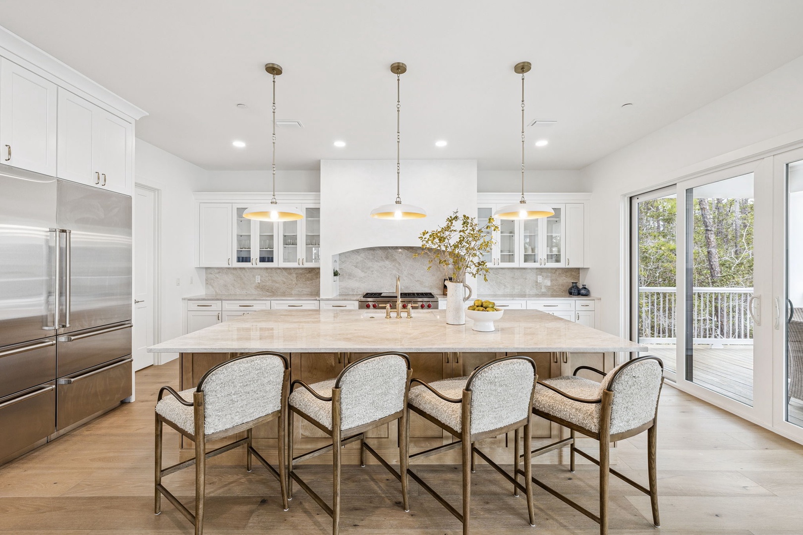 Your gourmet kitchen features marble countertops, premium appliances, and a spacious island perfect for cooking memorable meals together.