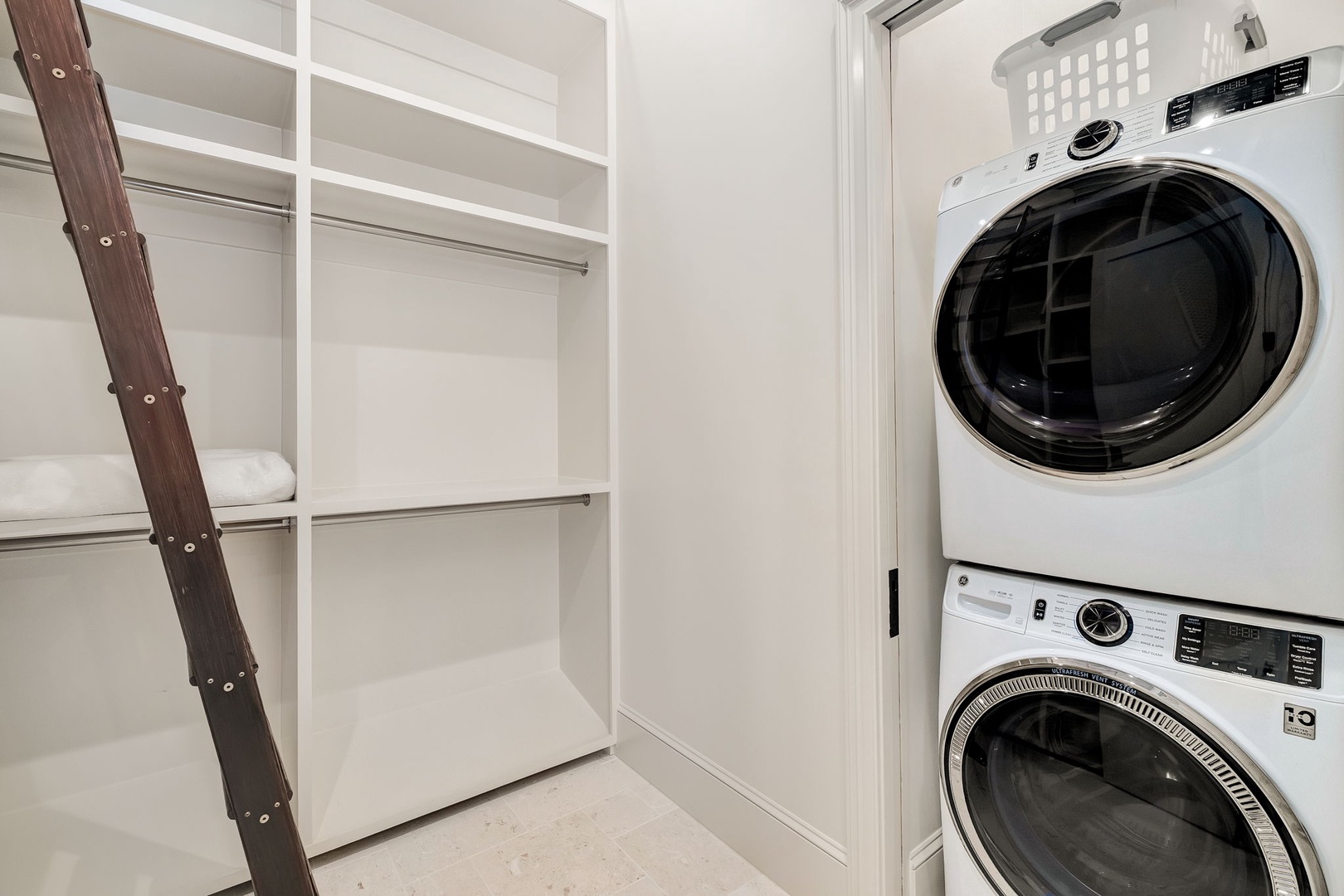 Store your belongings in the built-in shelving and keep clothes fresh with the convenient in-unit washer and dryer, making your stay effortless and comfortable.