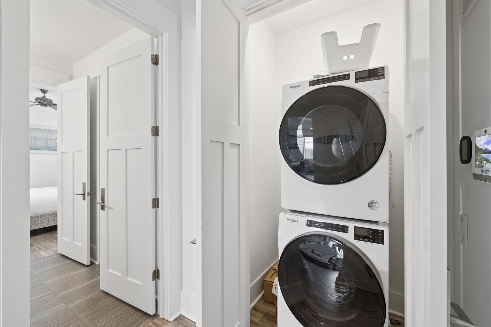 Your in-unit laundry closet features stacked washer and dryer, making it easy to keep your clothes fresh throughout your stay.