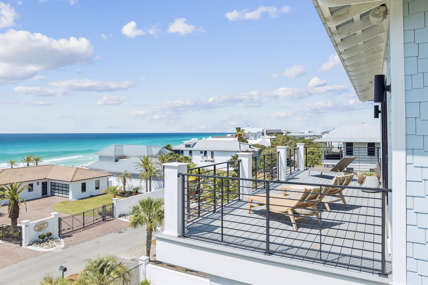 Stunning ocean views await from this private balcony, where you can sip morning coffee while watching turquoise waves.
