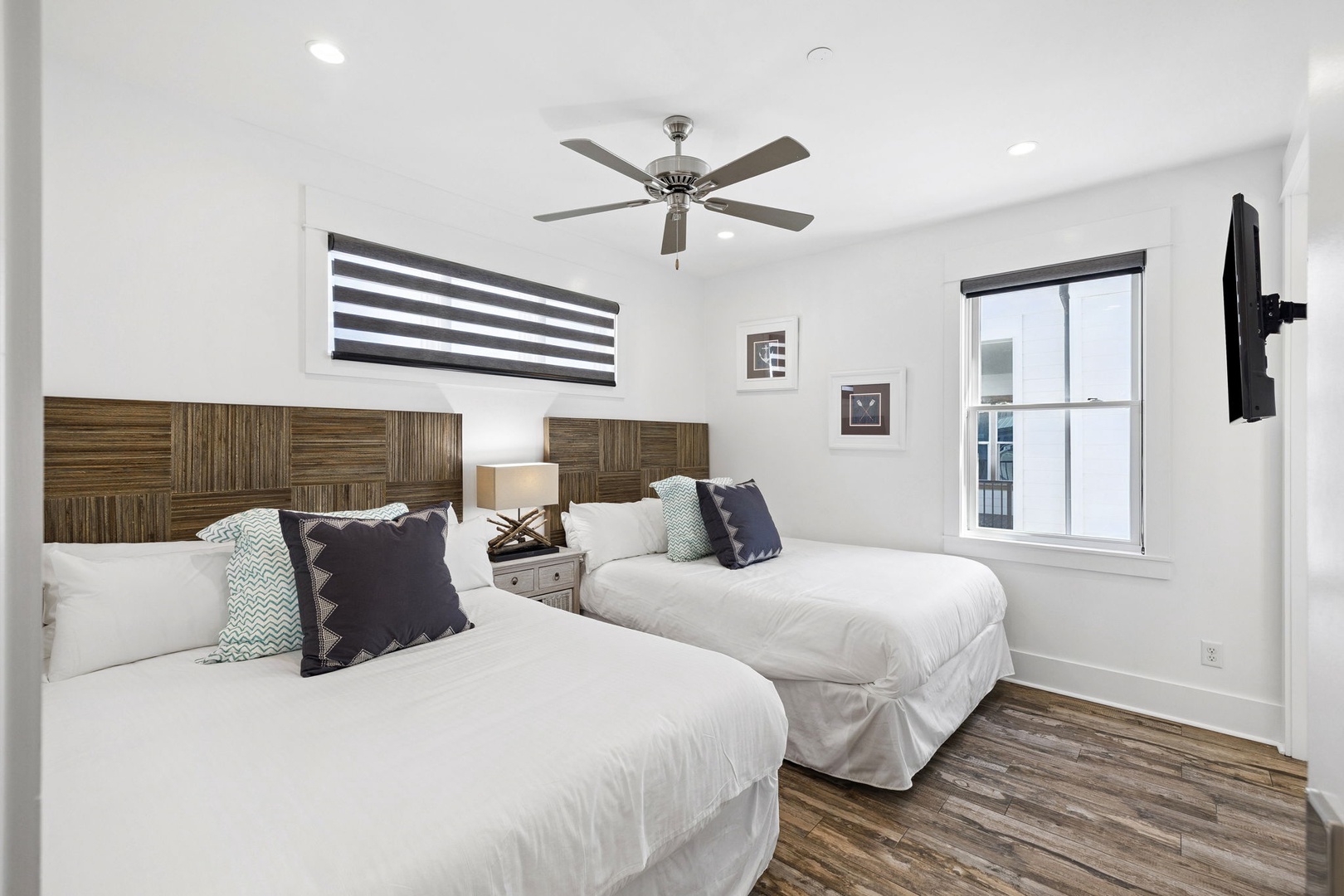 Rest peacefully in your bright twin bedroom with plush linens, modern amenities, and natural light streaming through.