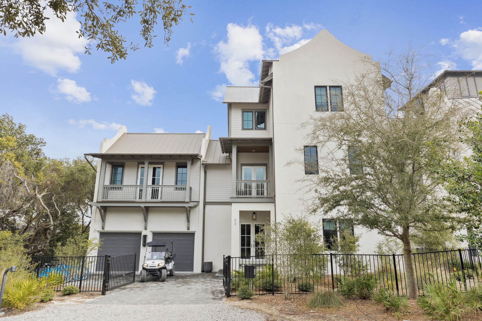 Contemporary architecture meets coastal charm in this modern vacation rental, featuring clean lines and spacious design.