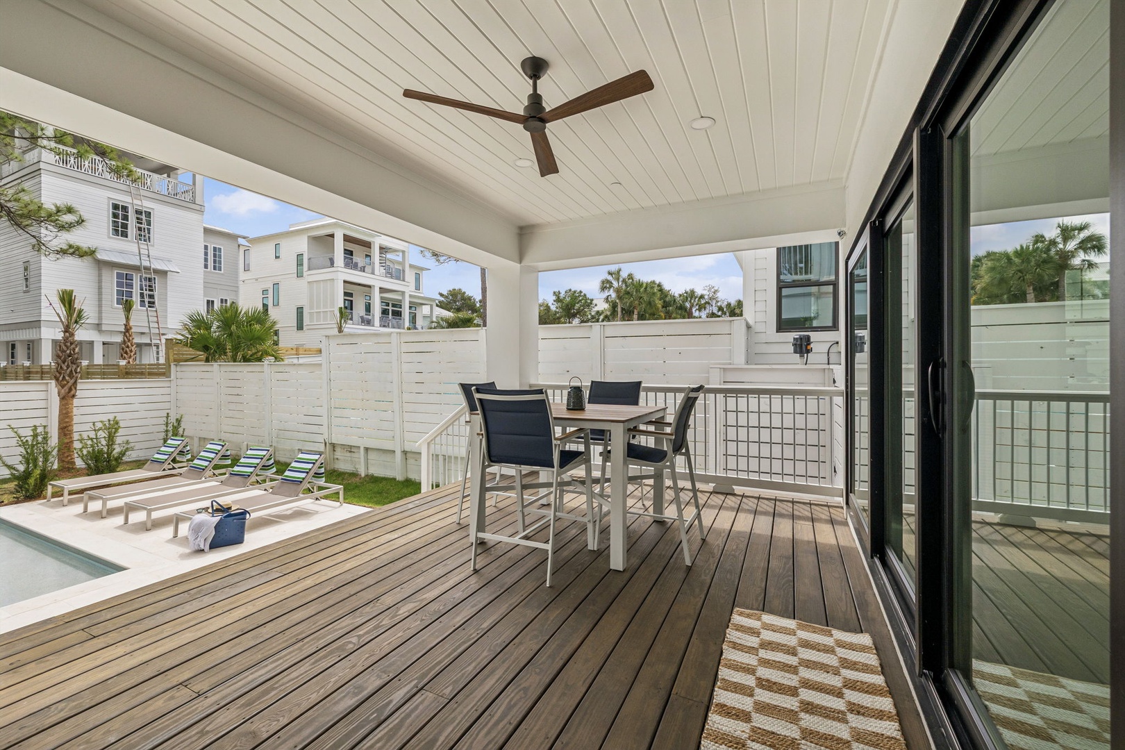 Your private covered deck offers the perfect spot for morning coffee or evening meals, with a ceiling fan keeping you comfortable year-round.