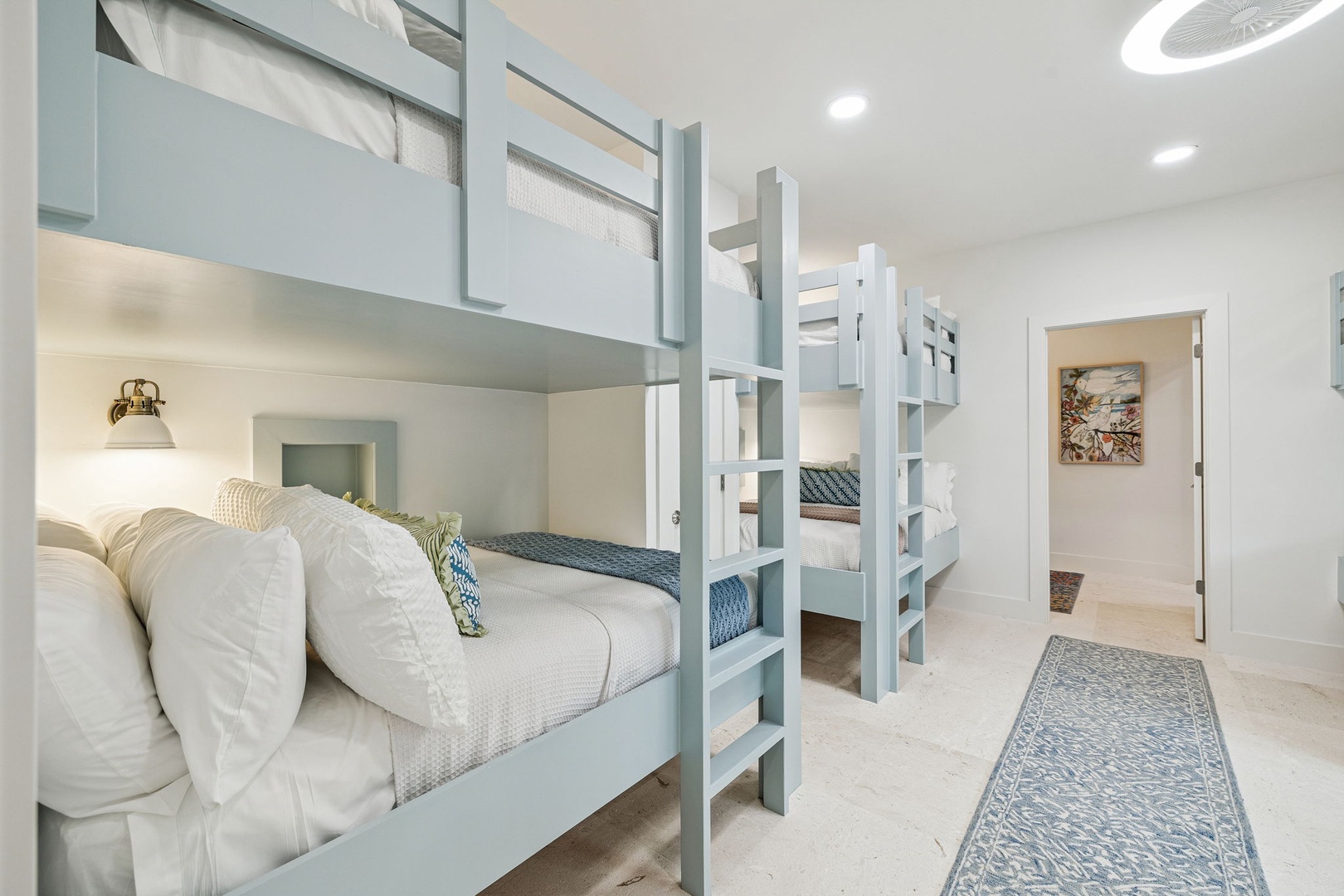 Rest peacefully in your thoughtfully designed bunk room with built-in reading lights and premium linens for ultimate comfort.