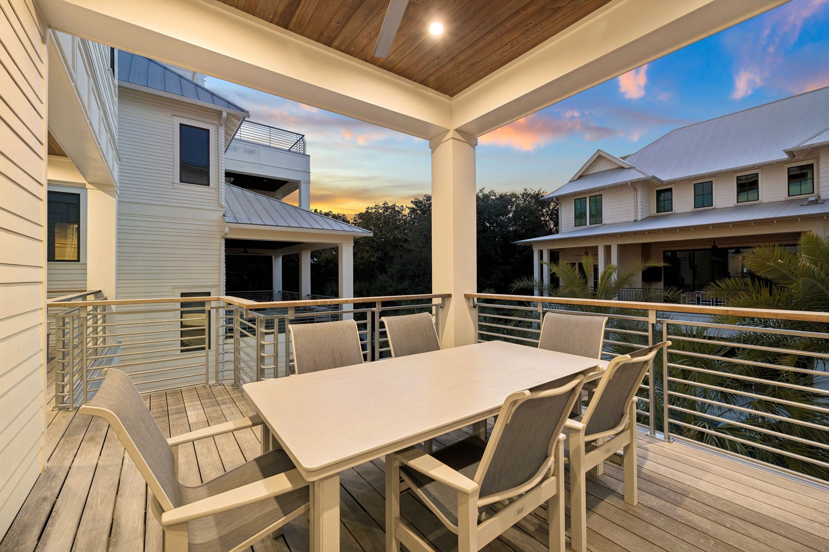 Savor evening meals on your private balcony while watching spectacular sunsets paint the sky in vibrant colors above the peaceful neighborhood.