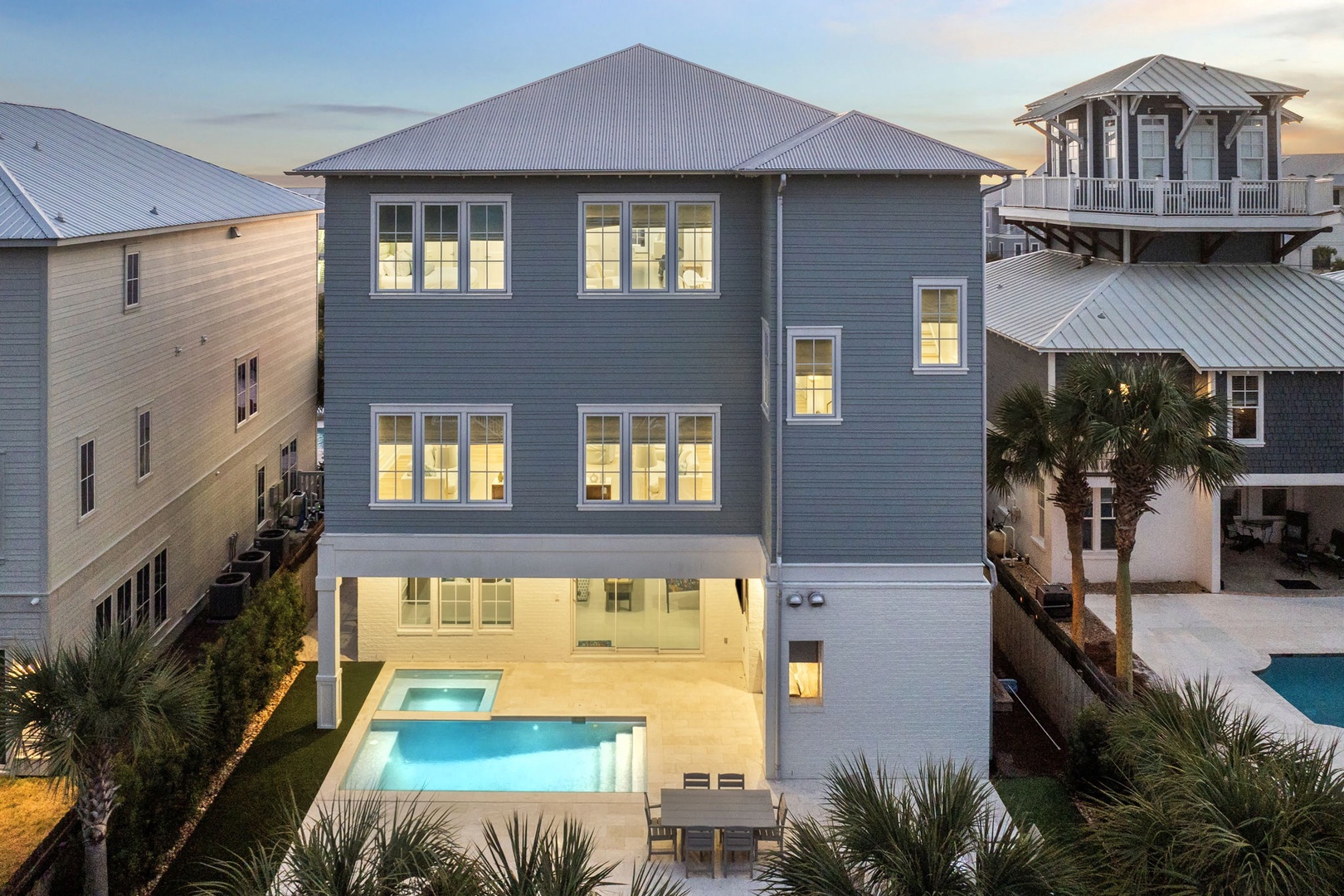 A stunning coastal retreat featuring modern architecture, private pool, and tropical landscaping in an exclusive beachside neighborhood.