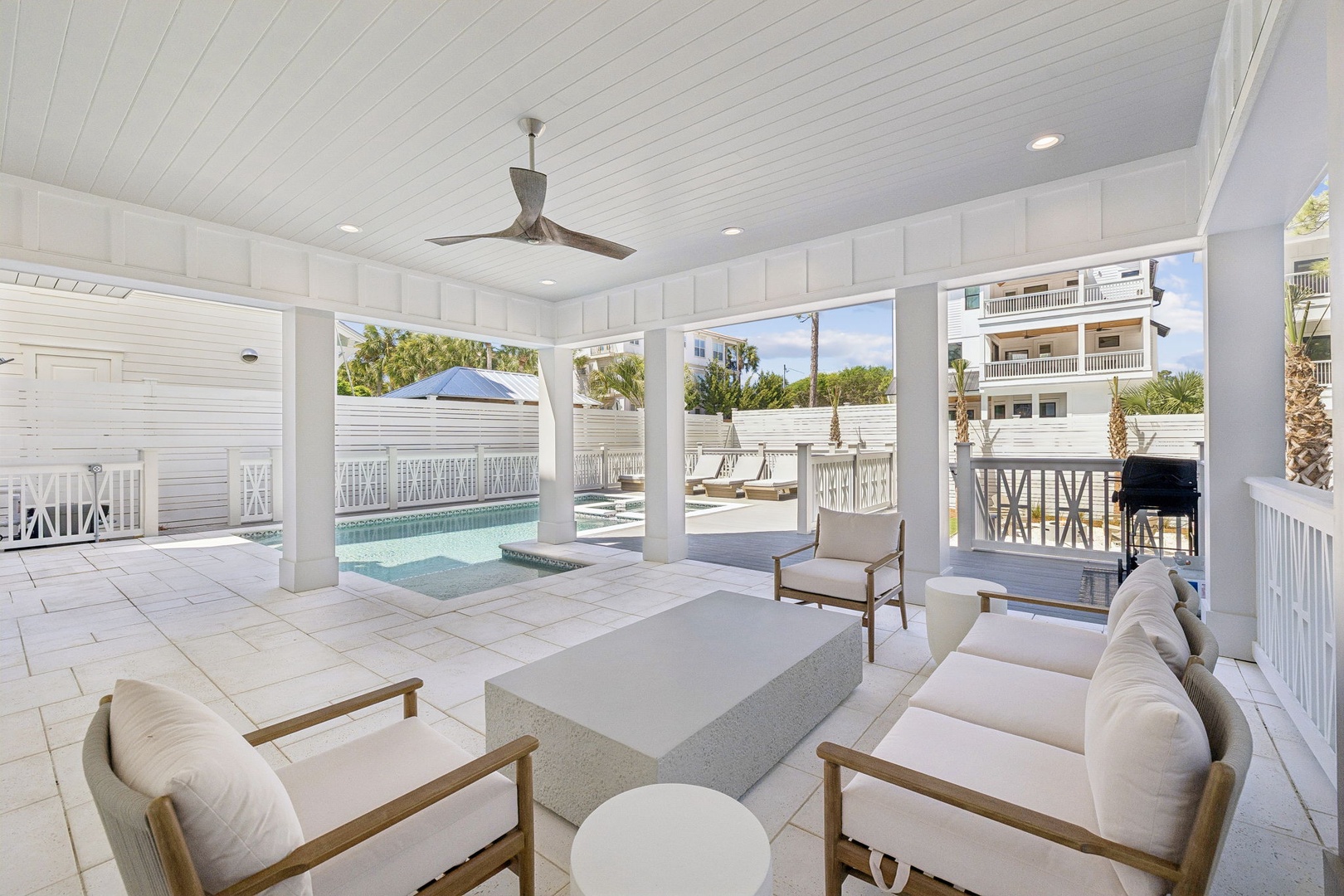 Relax in your private covered pavilion with plush seating overlooking your sparkling pool and tropical surroundings.