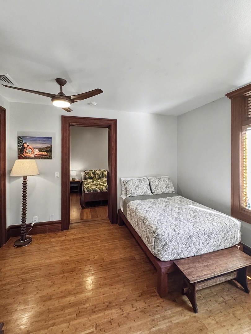 Kailua-Kona Vacation Rentals, Hahalua Bay Villa - Rest peacefully in your cozy bedroom with beautiful wood accents and a ceiling fan to keep you cool throughout the night.
