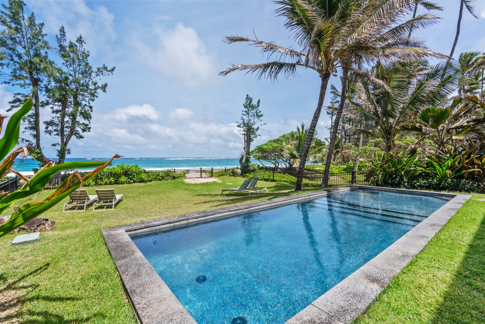 Laie Vacation Rentals, Laie Beachfront Estate - Take a plunge in the pool.