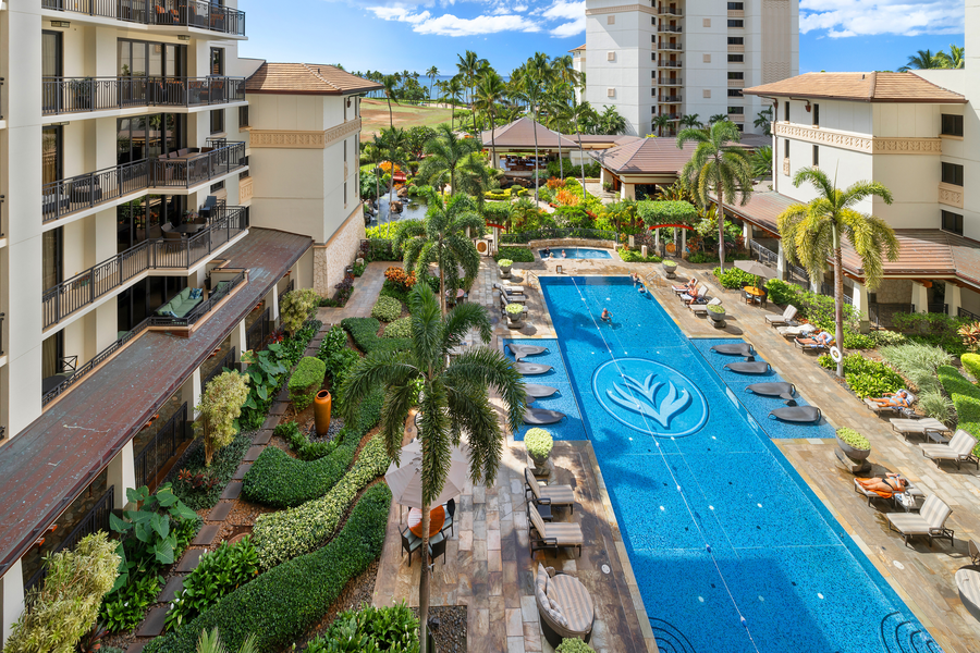 Kapolei Vacation Rentals, Ko Olina Beach Villas O724 - Resort pool view from the lanai with a glimpse of the ocean.