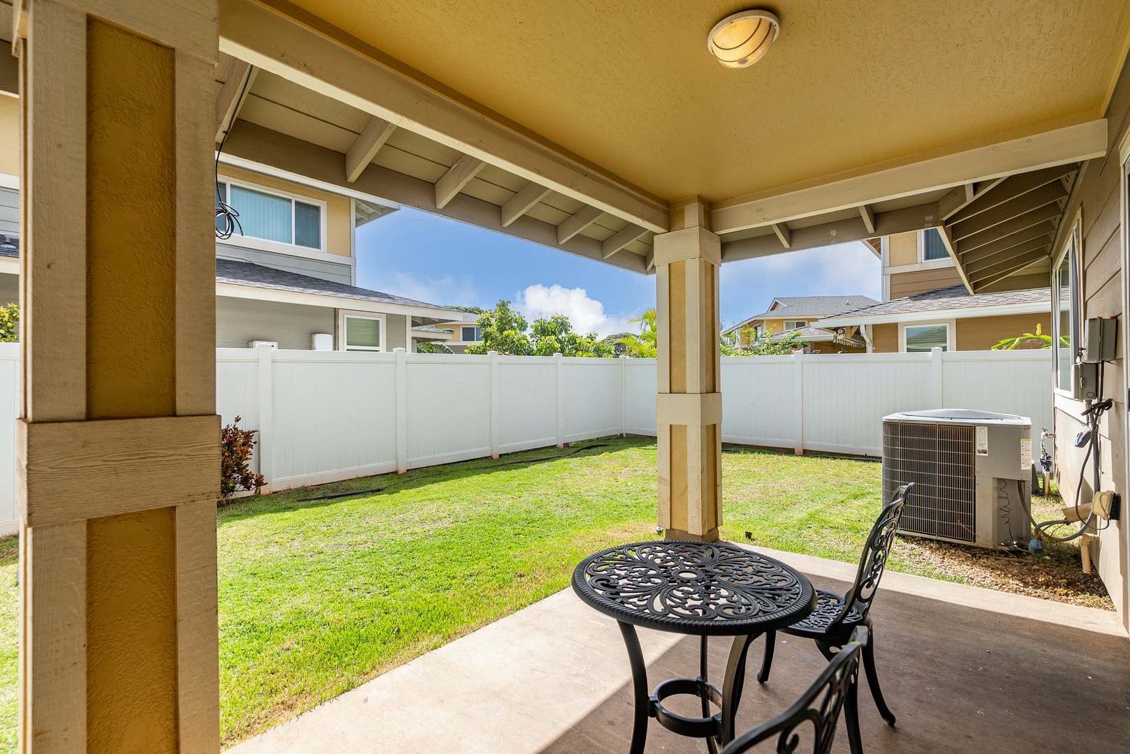 Kapolei Vacation Rentals, Kilipue Retreat - Covered lanai with outdoor seating—perfect for morning coffee or evening grilling.