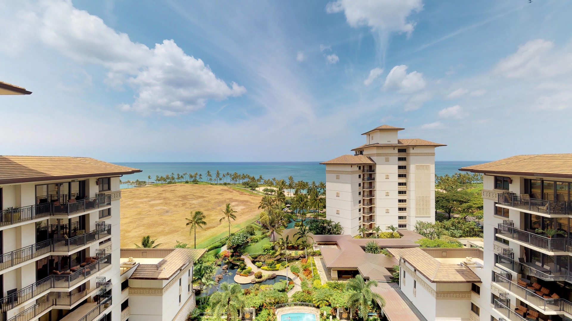 Kapolei Vacation Rentals, Ko Olina Beach Villas O1004 - The lanai offers ocean and pool views.