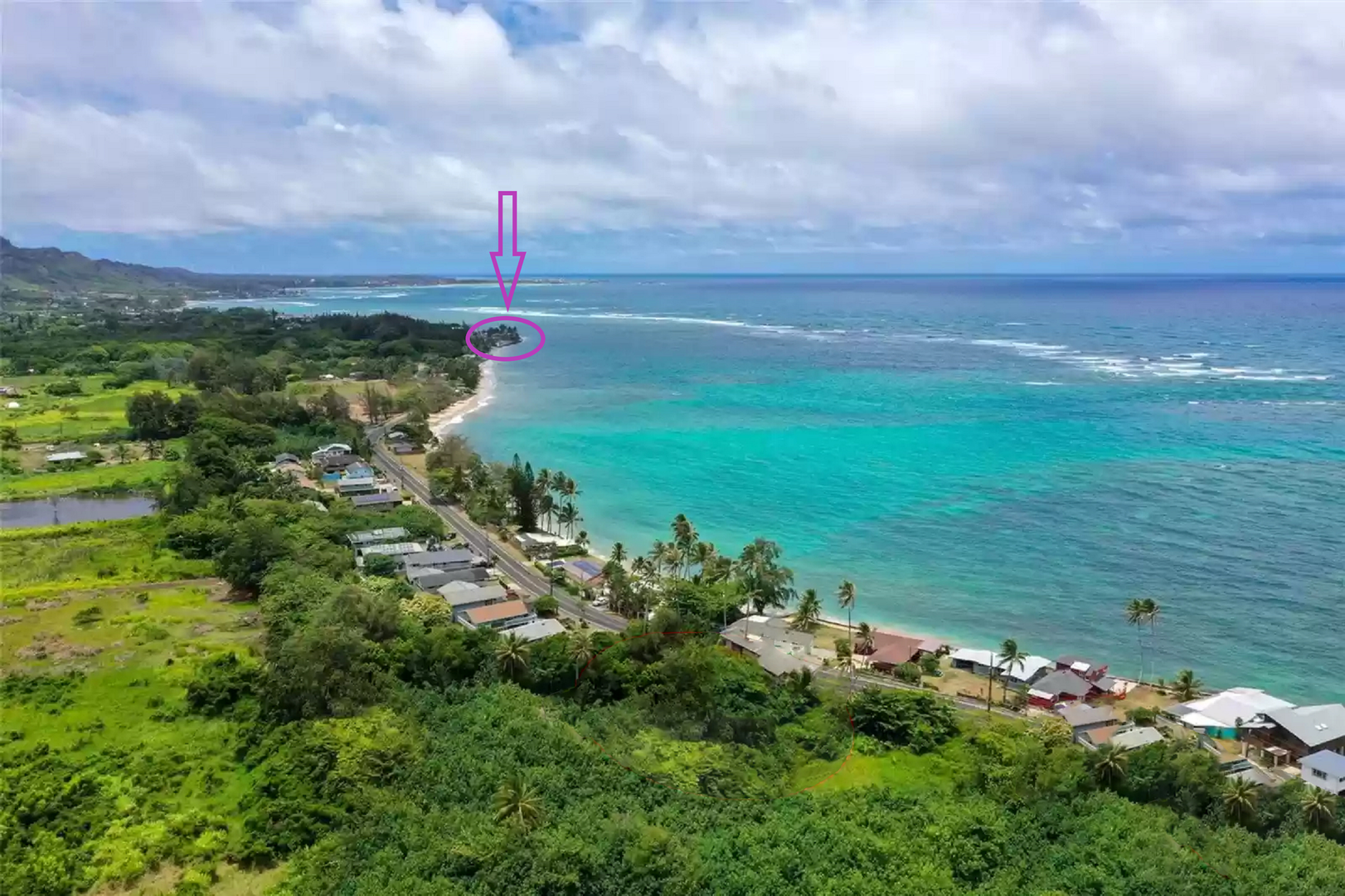 Hauula Vacation Rentals, Private Beach Paradise - An aerial perspective highlights the home’s prime oceanfront location and the natural reef barrier offshore, creating calm waters ideal for snorkeling and swimming.