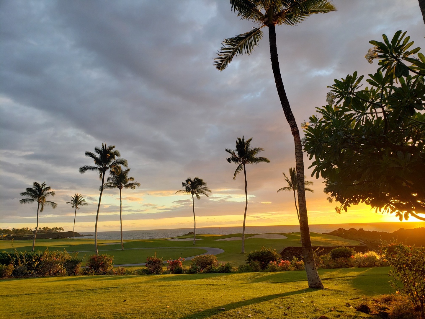 Kamuela Vacation Rentals, Mauna Lani Point E105 - As the sun dips below the horizon, nature paints the sky with vibrant hues.