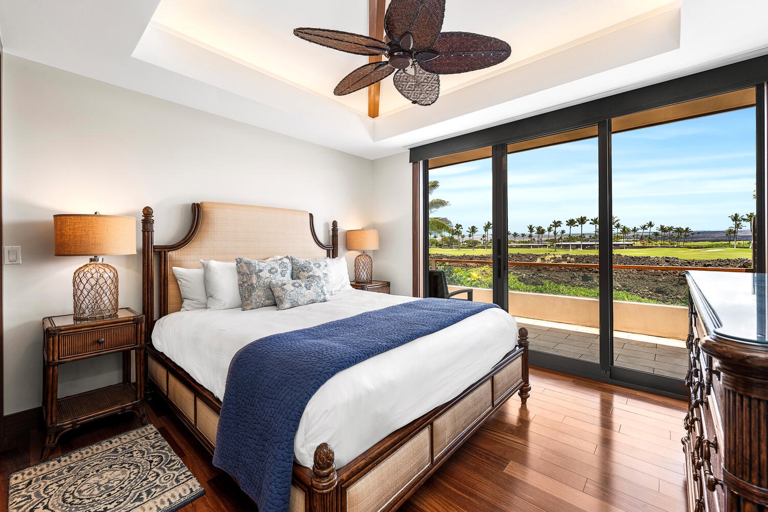 Kamuela Vacation Rentals, Laule'a Ohana Retreat - King guest suite with lanai access and rich hardwood floors at Laule'a #13.