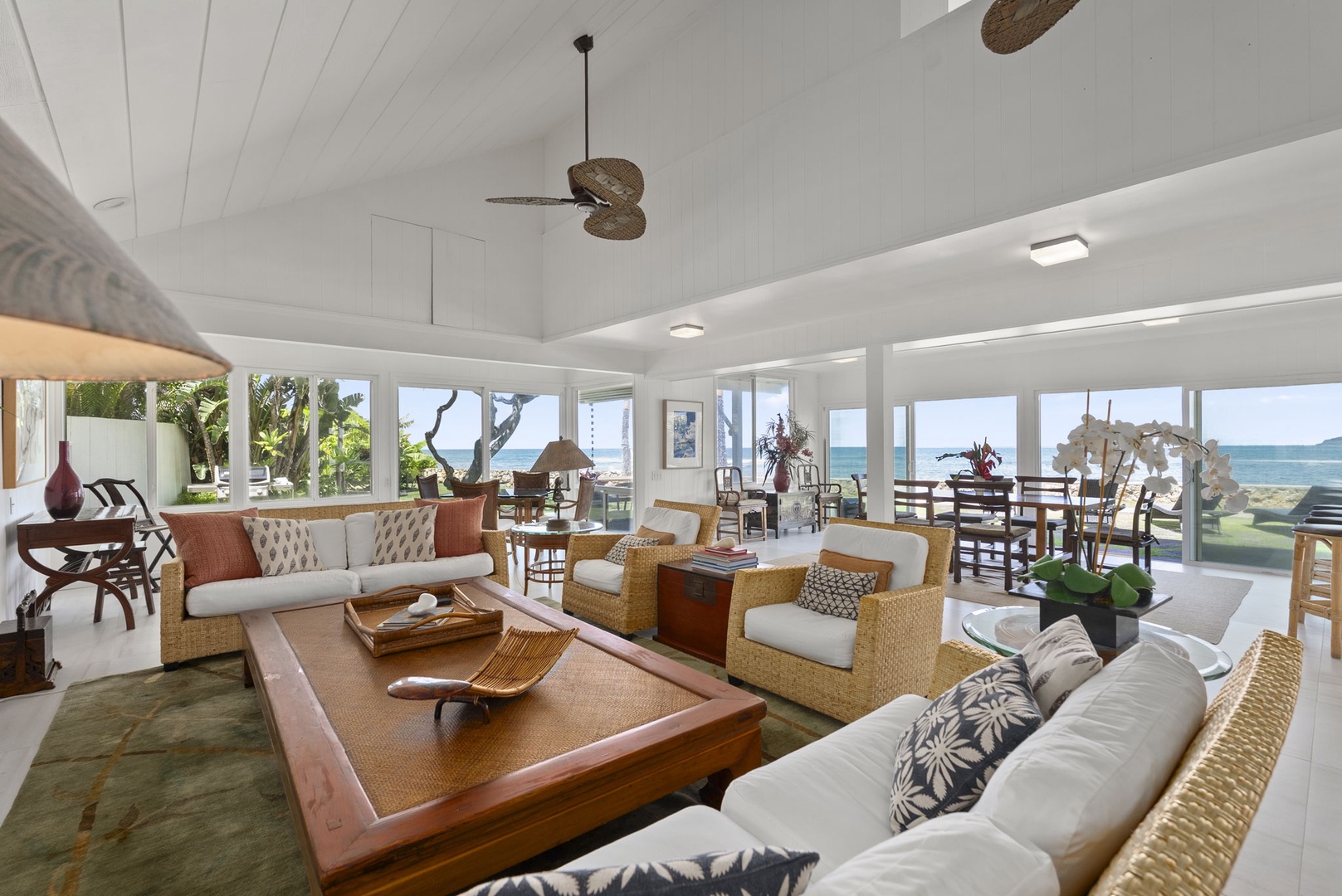 Waianae Vacation Rentals, Ma'ili Blue Estate - Unwind in this stunning oceanfront living space where panoramic sea views flood through floor-to-ceiling windows, creating your perfect tropical retreat.