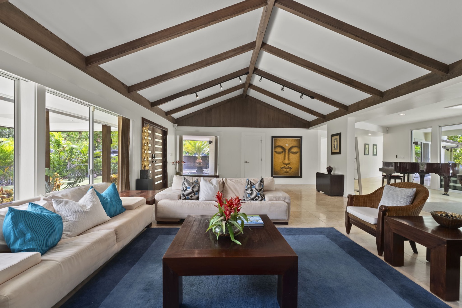 Honolulu Vacation Rentals, Kahala Lani - Living room with plush sectional, creating the perfect spot to watch movies or unwind together.