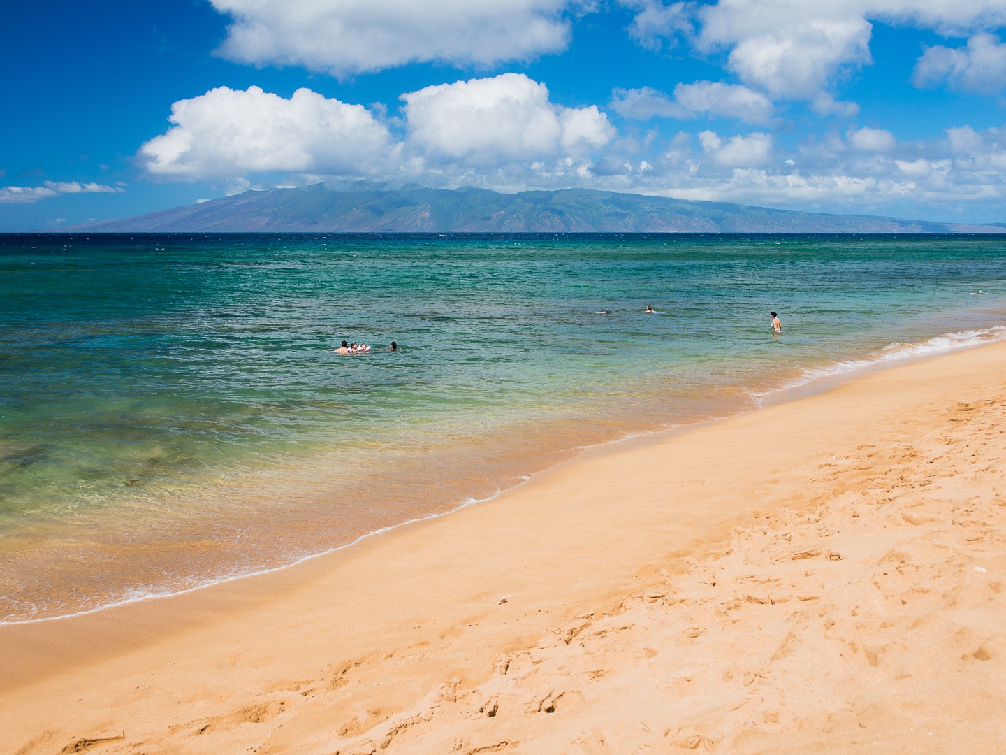 Lahaina Vacation Rentals, Honua Kai Konea 206 - Beachfront at Honua Kai Konea 206 with golden sand and mountain views.