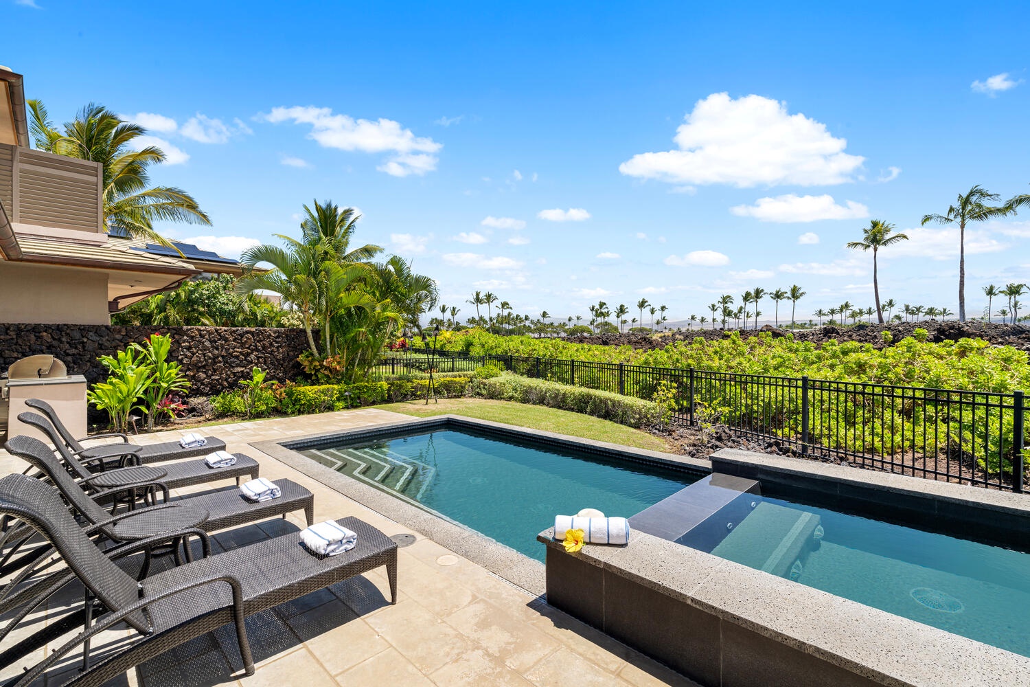 Kamuela Vacation Rentals, Laule'a at the Mauna Lani Resort #14 - Relax poolside with panoramic golf course and Mauna Kea views in the background.
