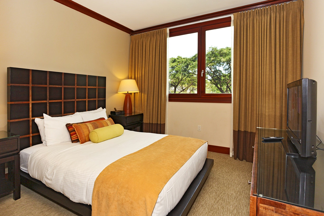Kapolei Vacation Rentals, Ko Olina Beach Villas B204 - The second guest bedroom with a queen bed and views.