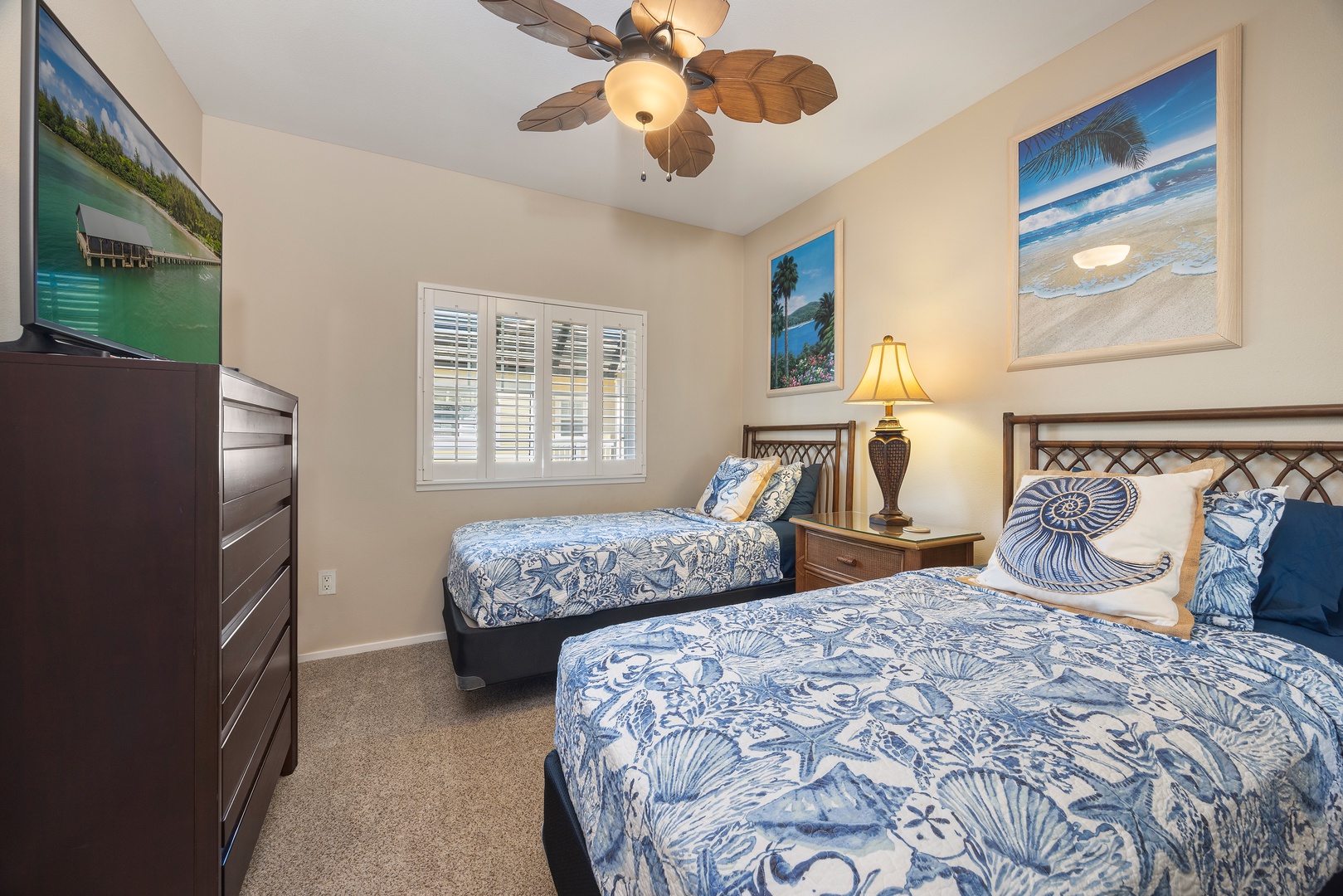 Drift into peaceful sleep surrounded by coastal charm and ocean-inspired decor in your comfortable twin bedroom retreat.