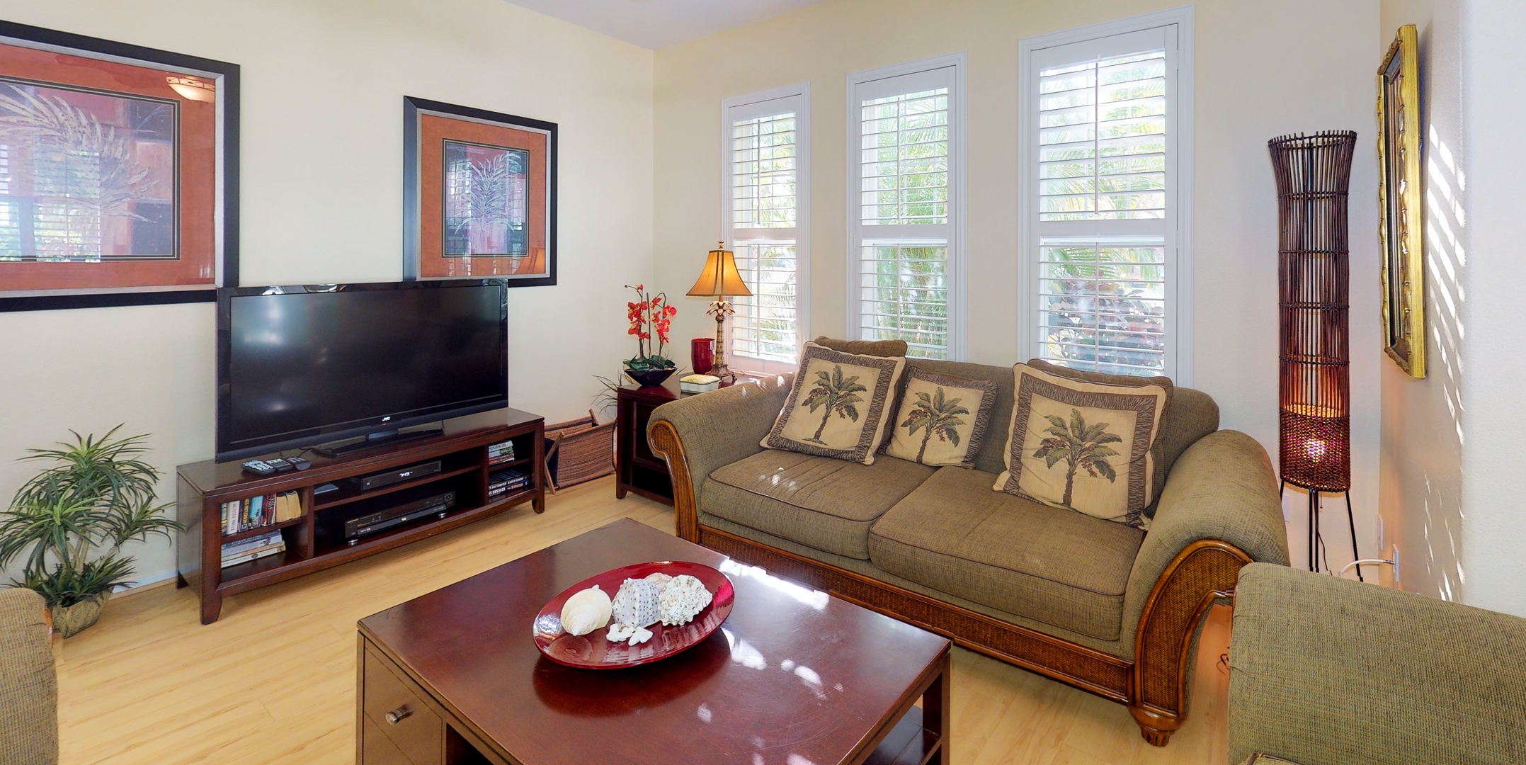 Kapolei Vacation Rentals, Coconut Plantation 1078-3 - Sink into the plush seating in the living area surrounded by natural wood tones and TV.