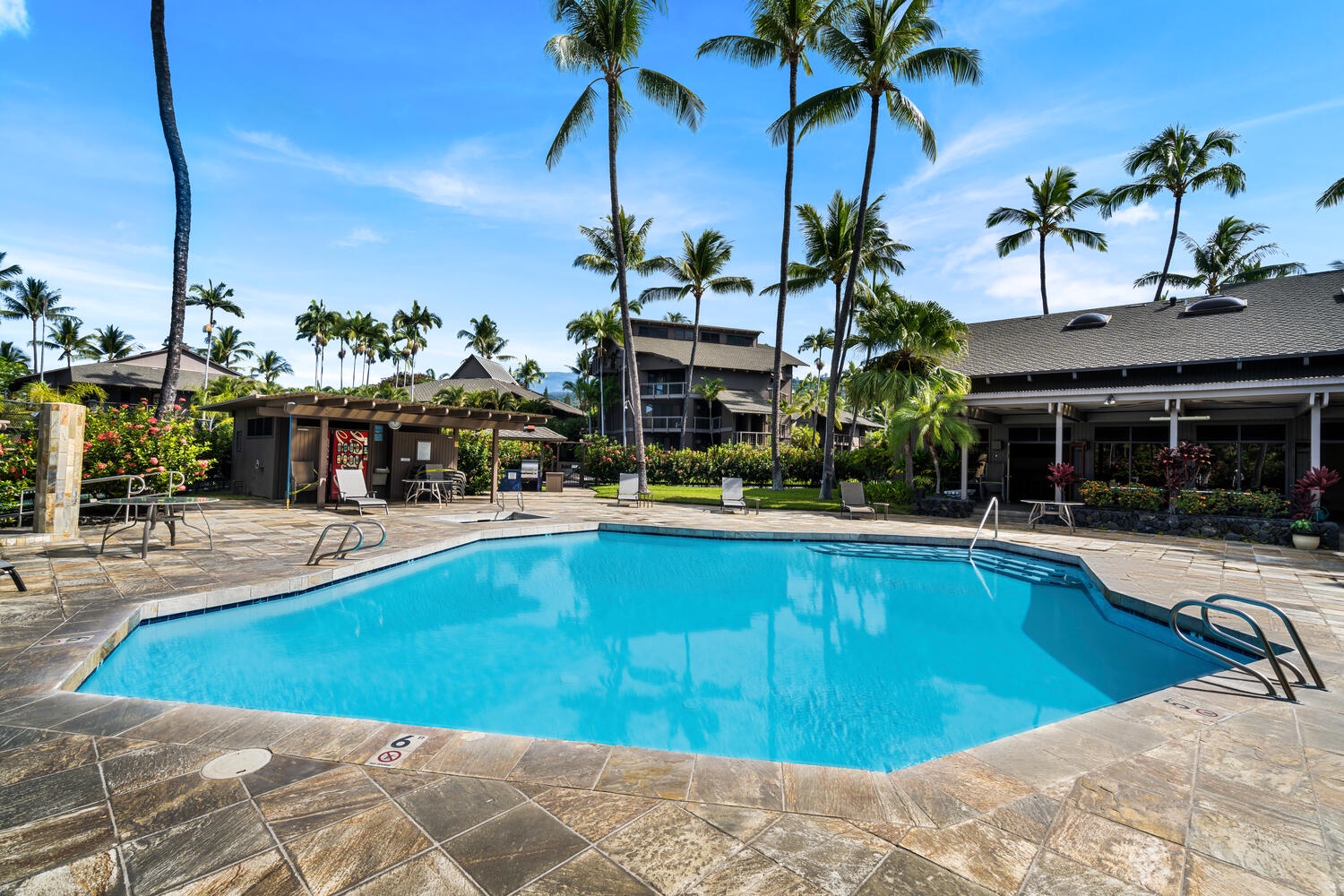 Kailua Kona Vacation Rentals, Kanaloa at Kona 3303 - The pool area has loungers and Hawaii sunshine!