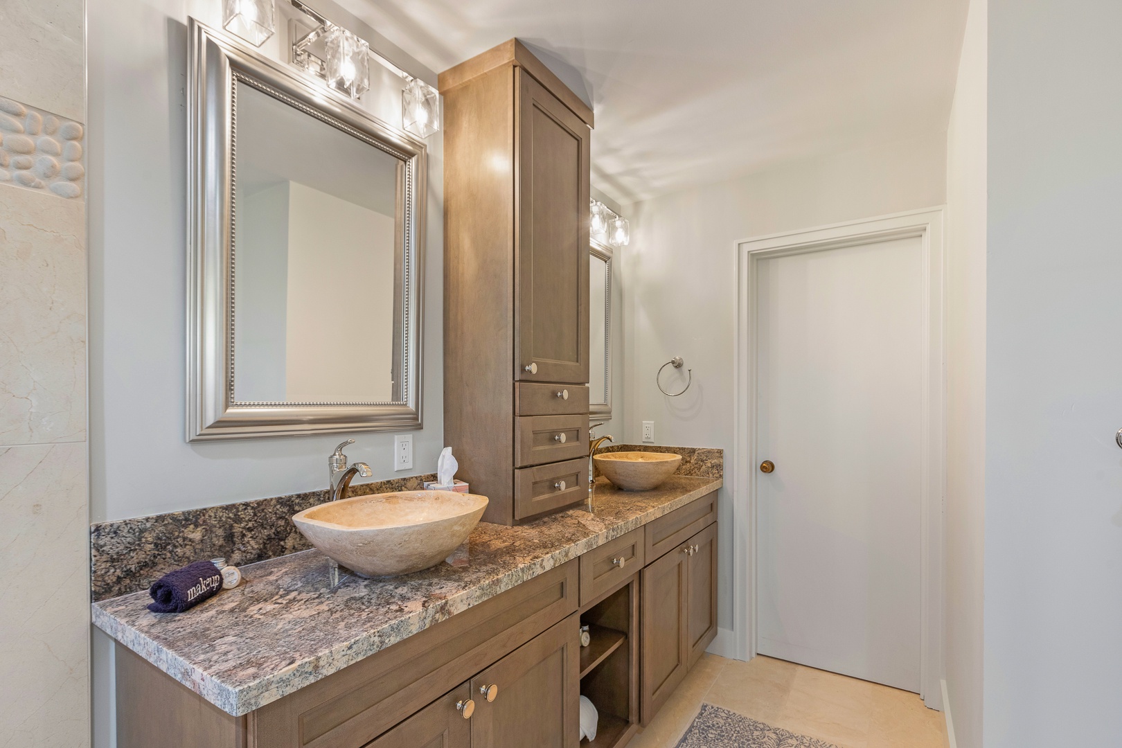 Lahaina Vacation Rentals, Kapalua Ridge 1622 - This luxurious ensuite bathroom features dual vessel sinks and elegant wood cabinetr