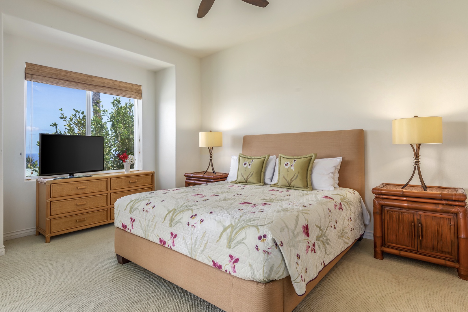 Kamuela Vacation Rentals, 2BD Kumulani (I-4) at Mauna Kea Resort - Primary bedroom with king sized bed, flat screen TV, and ocean views.