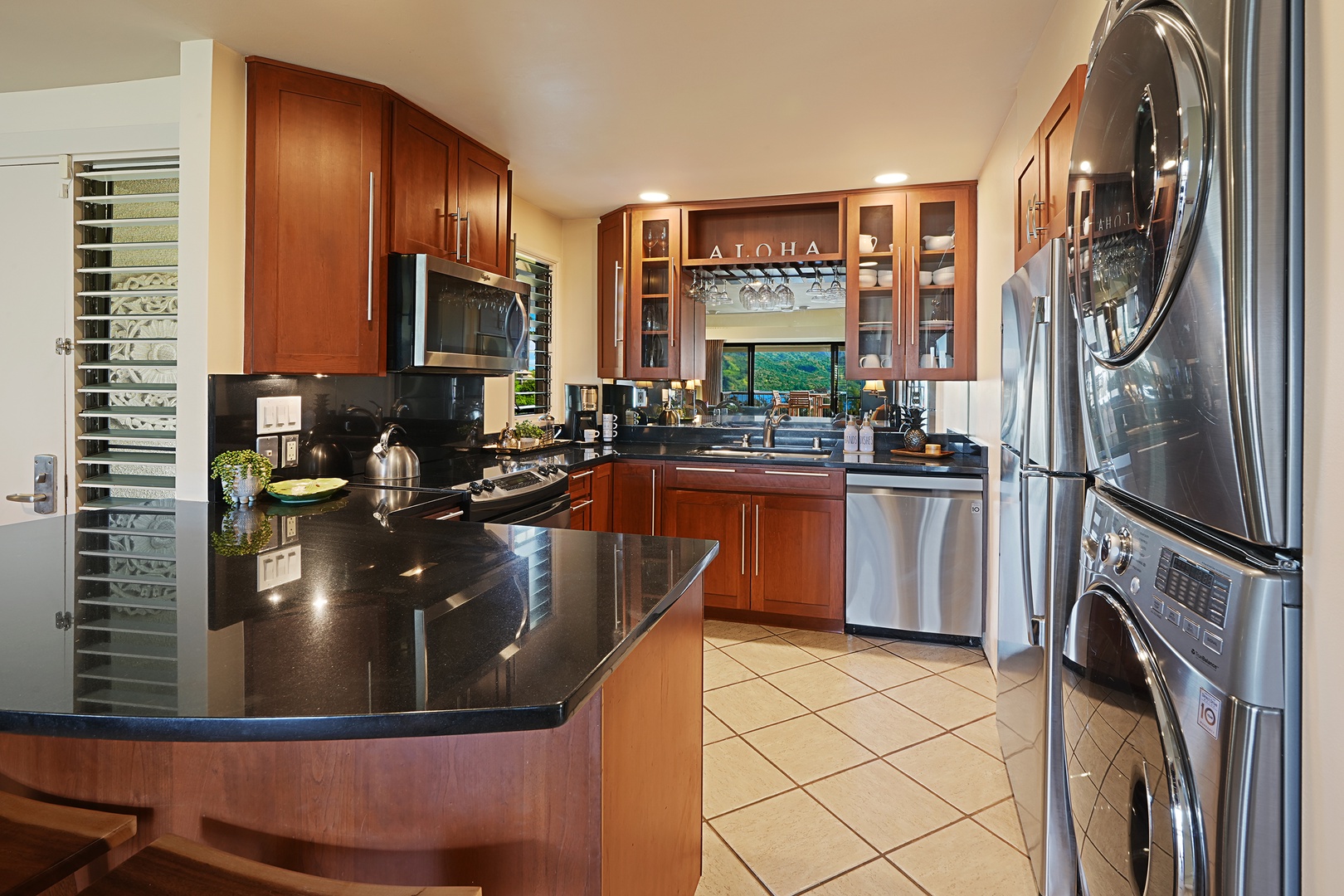 Princeville Vacation Rentals, Hanalei Bay Resort 4302/3 - Cook delicious meals in the fully-equipped kitchen with modern appliances and bar seating.