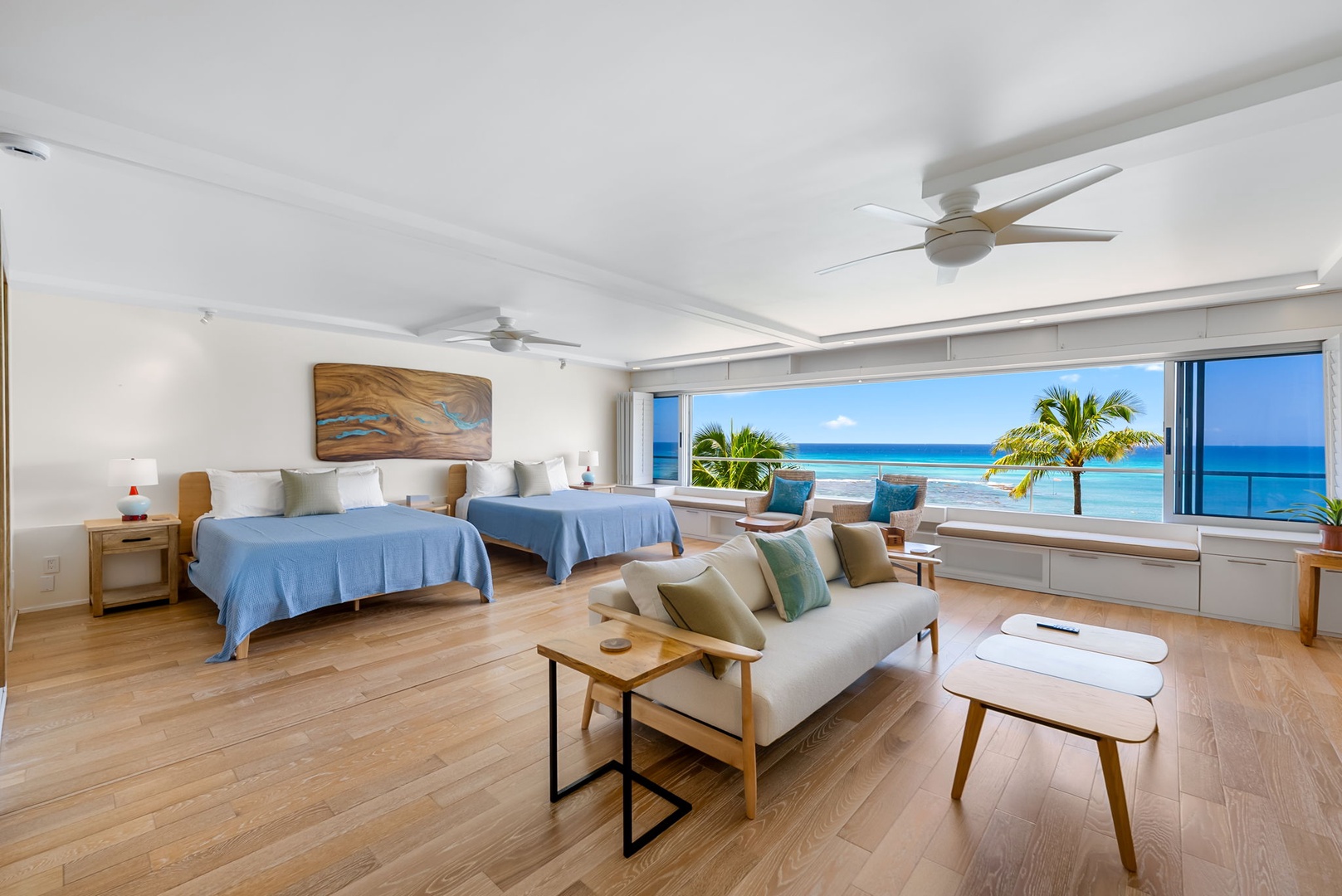 Honolulu Vacation Rentals, Colony Surf Luxe - Oceanview living and sleeping space with king-size bed and full sofa sleeper, perfect for relaxing and taking in the view.
