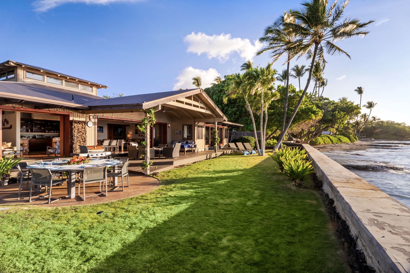 Kamuela Vacation Rentals, Island Time Retreat - The house glows against the water as the sky goes soft over the ocean.