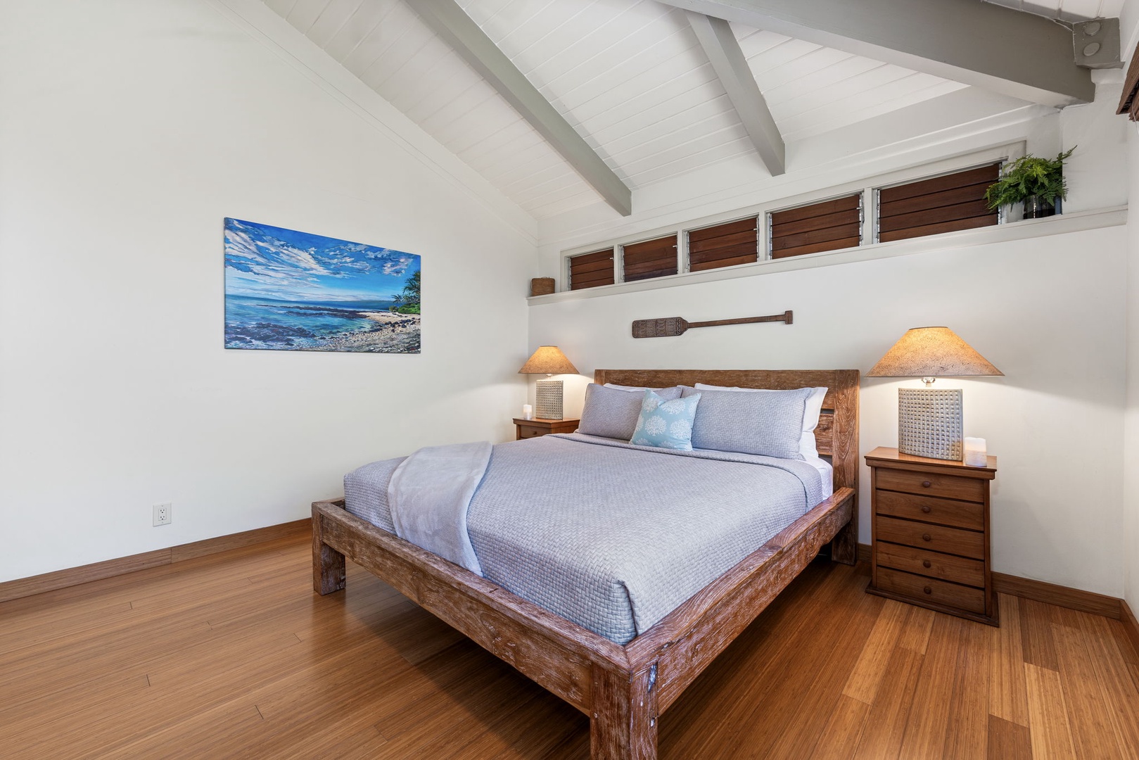 Kamuela Vacation Rentals, Island Time Retreat - Soft bedding and ocean-blue art make this a restful place to land each night.