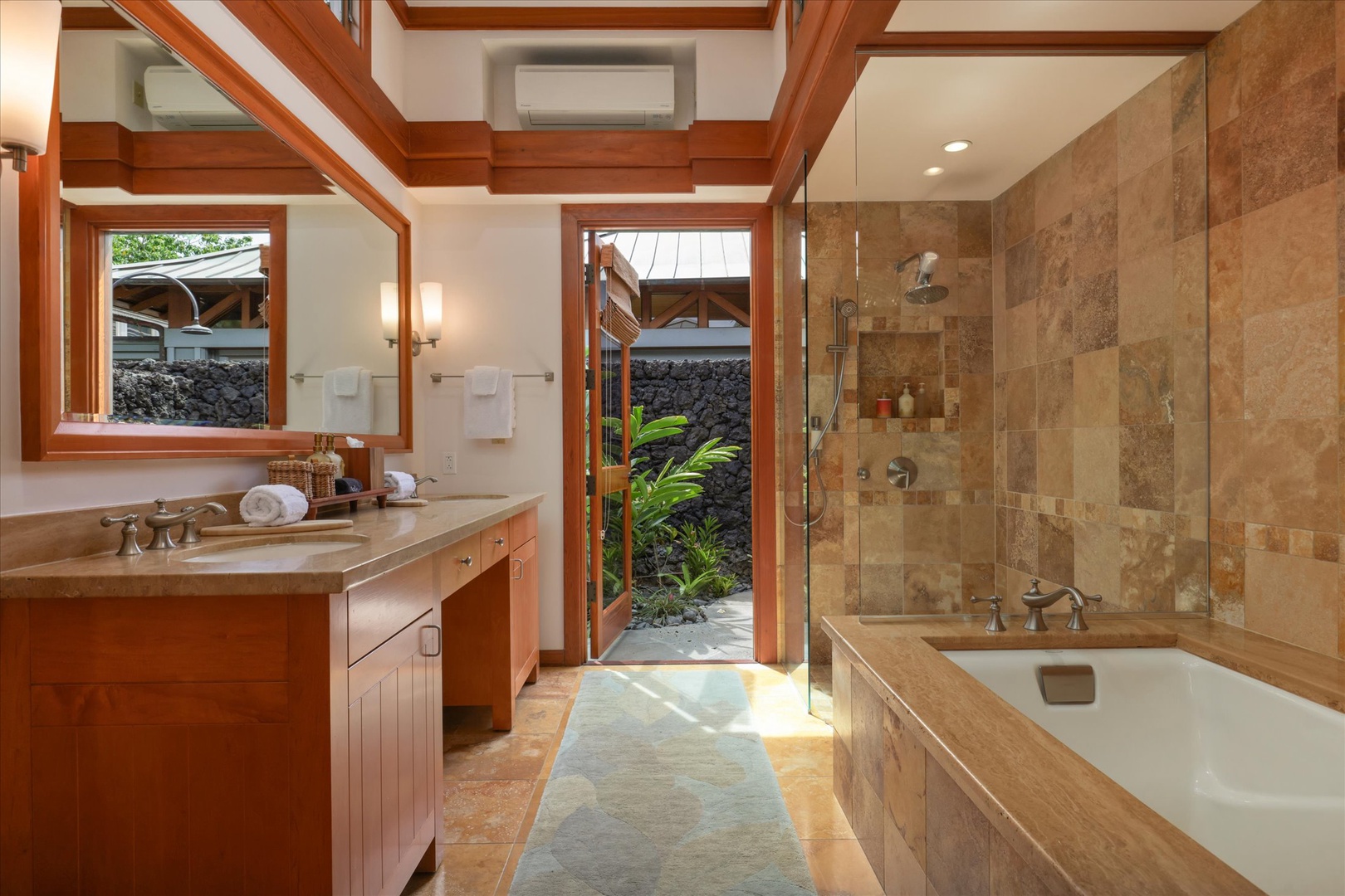 Kamuela Vacation Rentals, 3BD Na Hale 3 at Pauoa Beach Club at Mauna Lani Resort - Two sinks, a deep soaking tub, and a door that opens straight out to the lava-rock shower.
