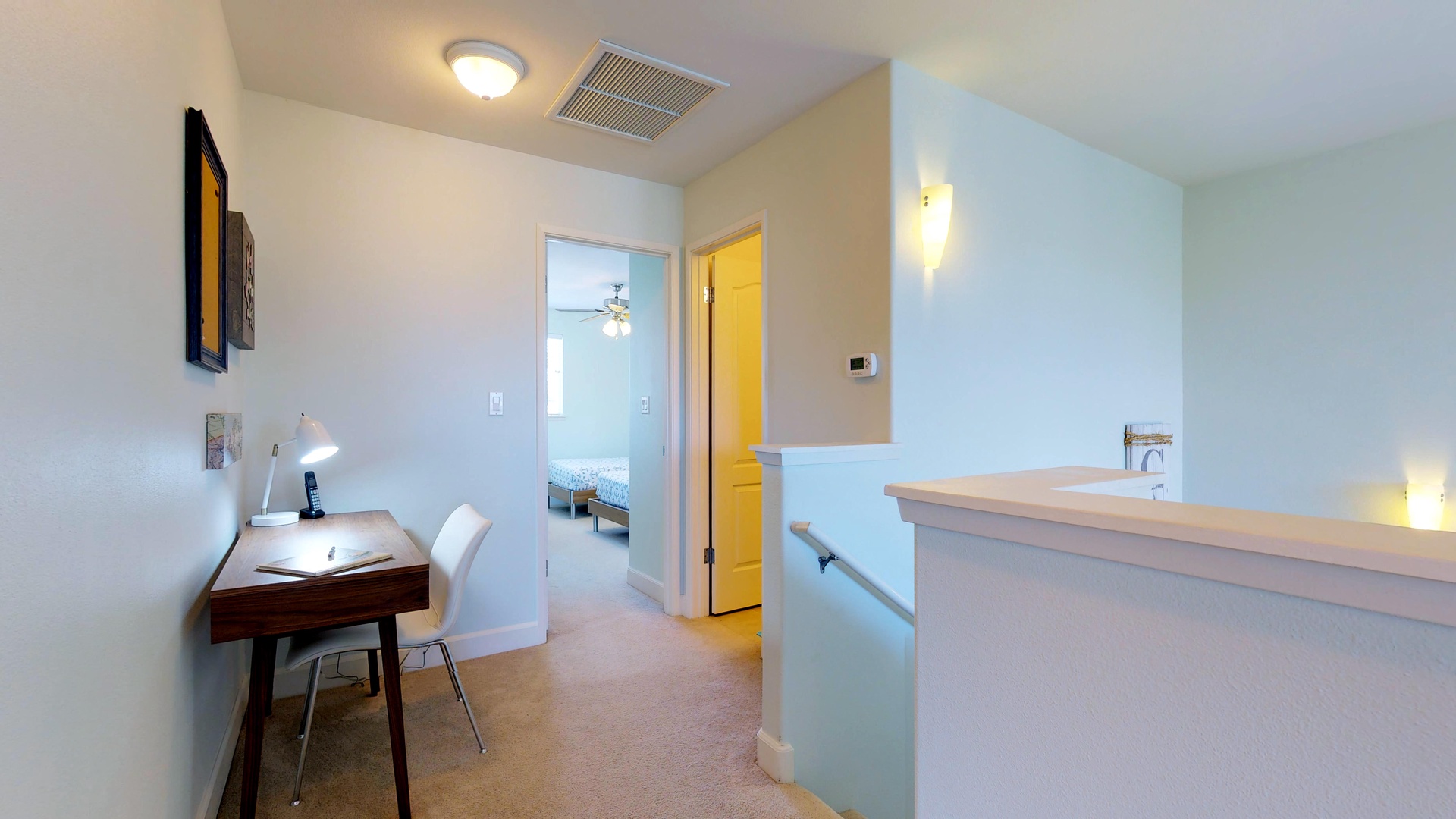 Kapolei Vacation Rentals, Ko Olina Kai 1035D - A desk and study space on the landing at the top of the stairs.