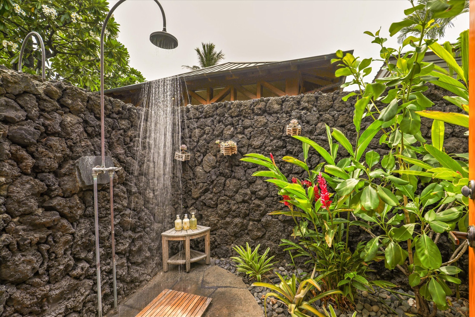 Kamuela Vacation Rentals, 3BD Na Hale 3 at Pauoa Beach Club at Mauna Lani Resort - Cool water runs down the lava-rock wall in a shower open to the sky and the ferns.