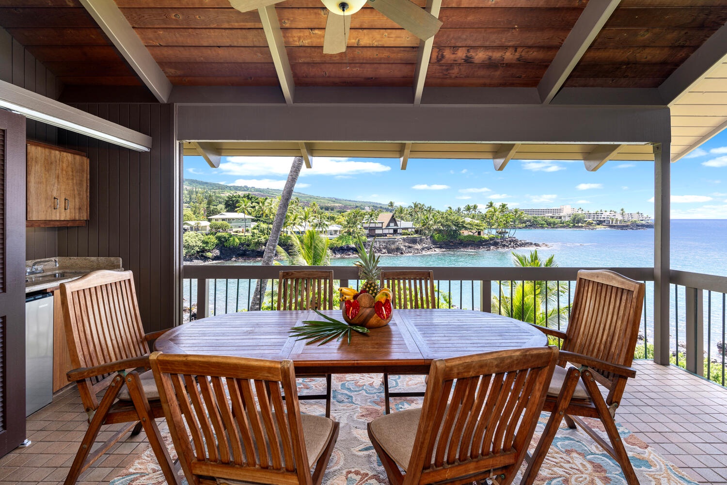 Kailua Kona Vacation Rentals, Kanaloa at Kona 3304 - Spacious covered lanai with oceanfront dining and stunning coastal views.