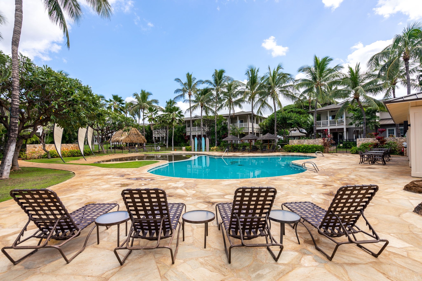 Kapolei Vacation Rentals, Coconut Plantation 1080-4 - Loungers line the community pool for the afternoons you do not leave the water.